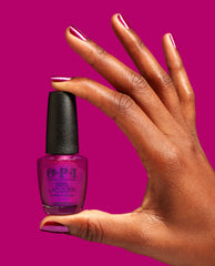 Berry and Bright Red Nail Polish Hand and Bottle