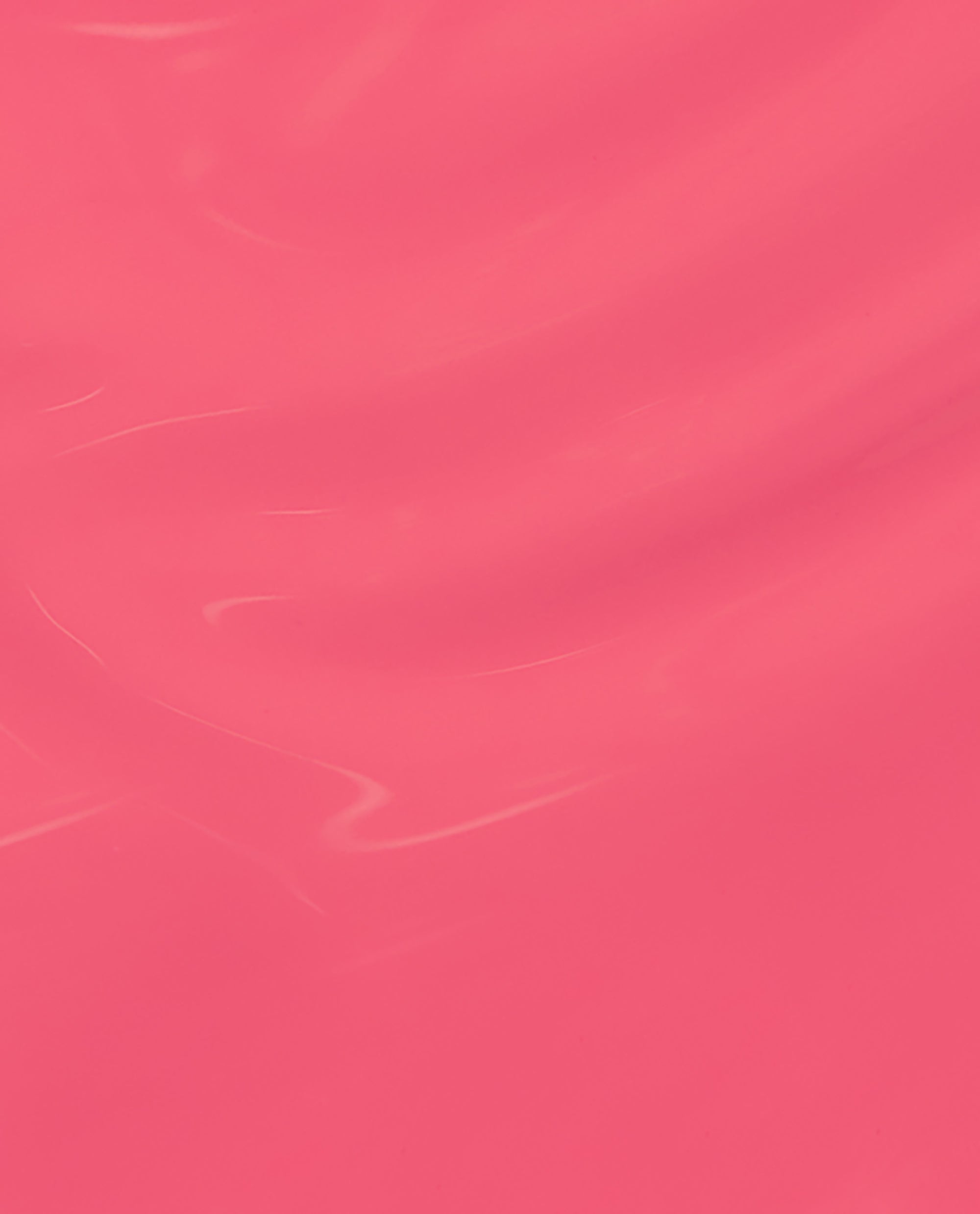 Big Bloom Energy OPI Nature Strong Vegan Nail Lacquer shows a glossy trending coral-pink brush swatch with subtle streaks on a full-frame polish background.