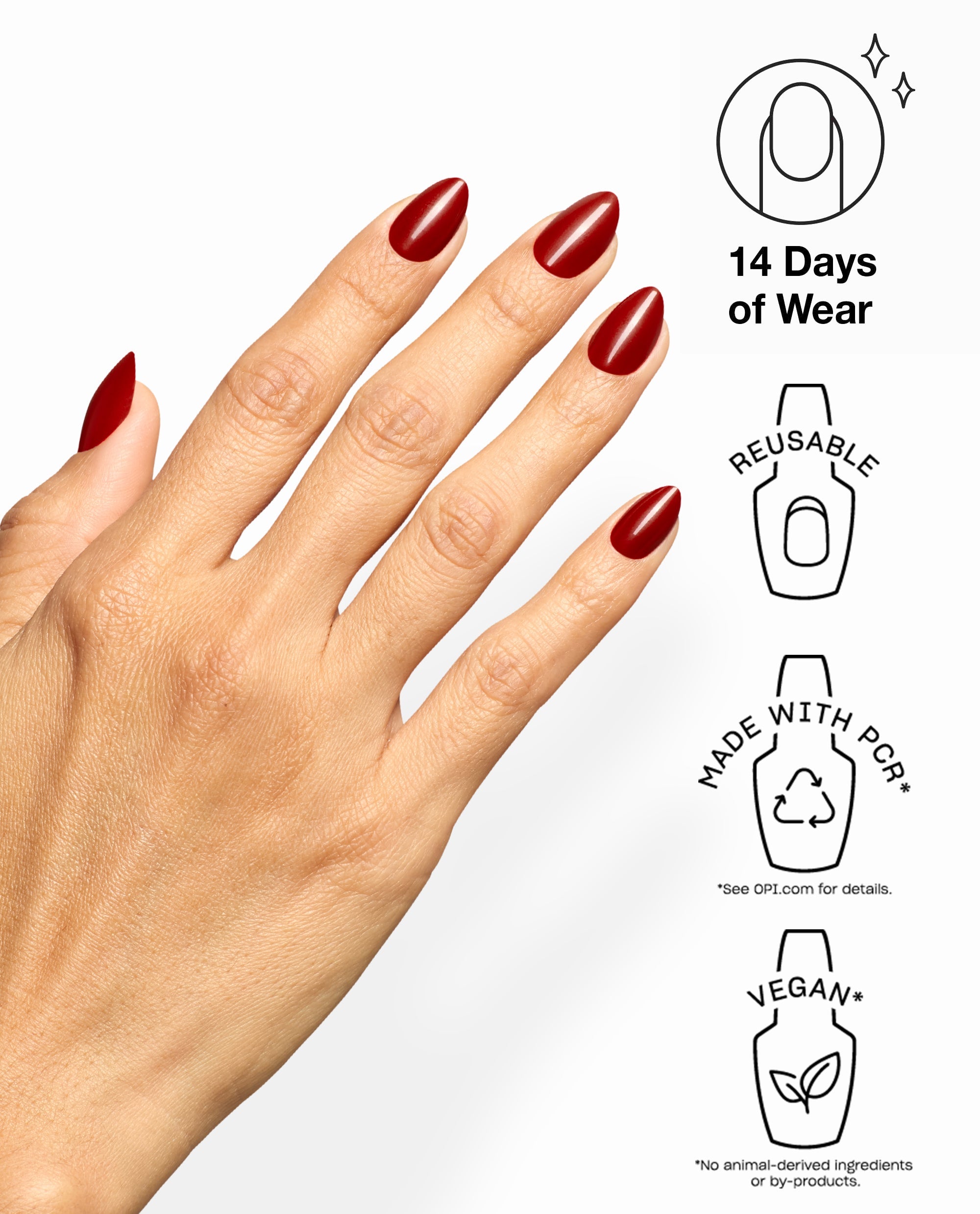 Hand wearing OPI Big Apple Red xPRESS/ON glossy red almond press-on nails, a bold fall nail color, with icons noting 14 days of wear, reusable design, PCR materials, and vegan formula.