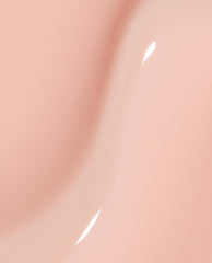 Glossy close-up swatch of OPI Bubble Bath Infinite Shine, showing the smooth, pale pink nail polish finish with subtle shine, ideal for a soft neutral look in an OPI nail polish gift set.