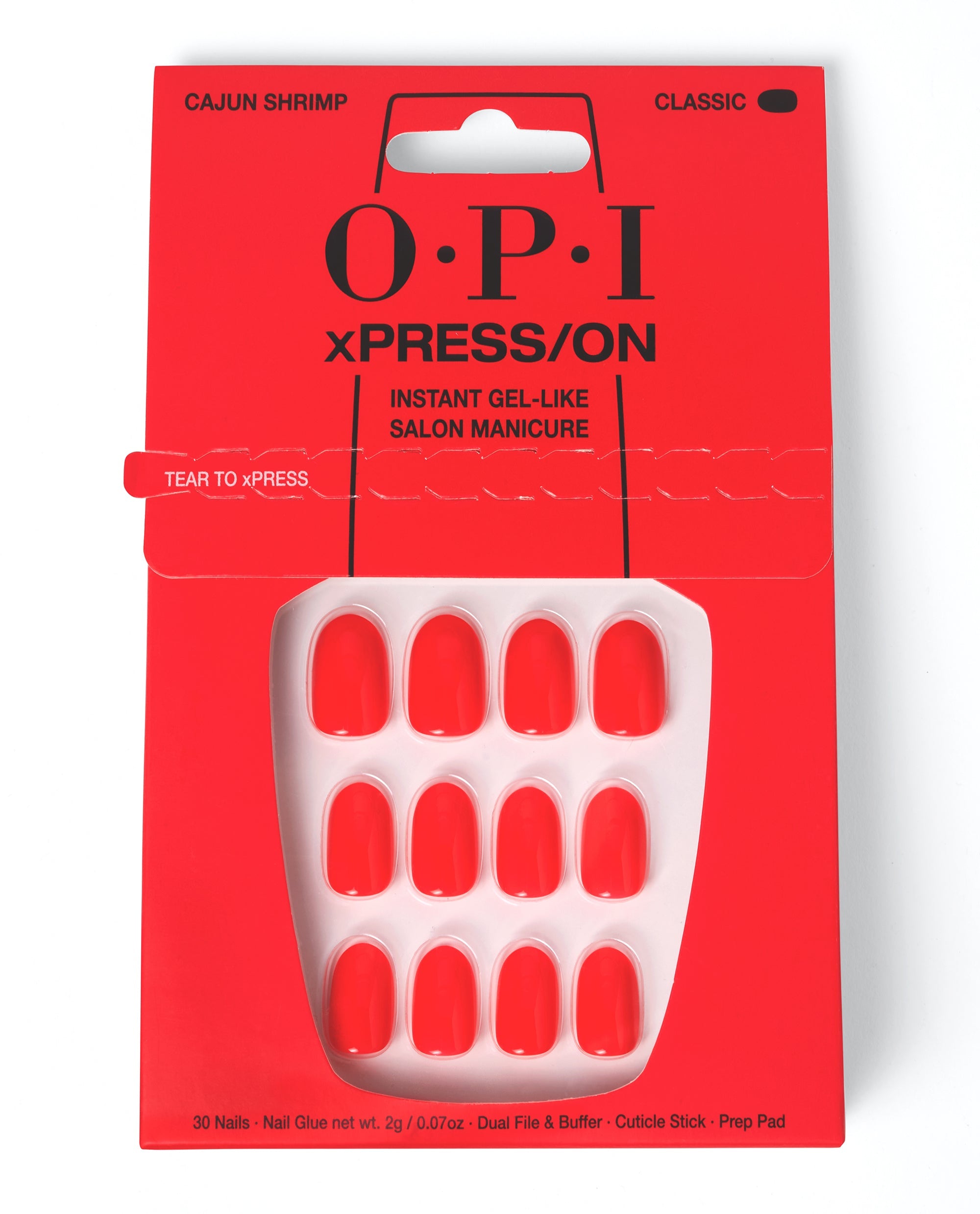 OPI xPRESS/ON Cajun Shrimp press-on nails displayed in bright coral-red packaging, showing glossy short classic artificial nails for a trending instant gel-like salon manicure.