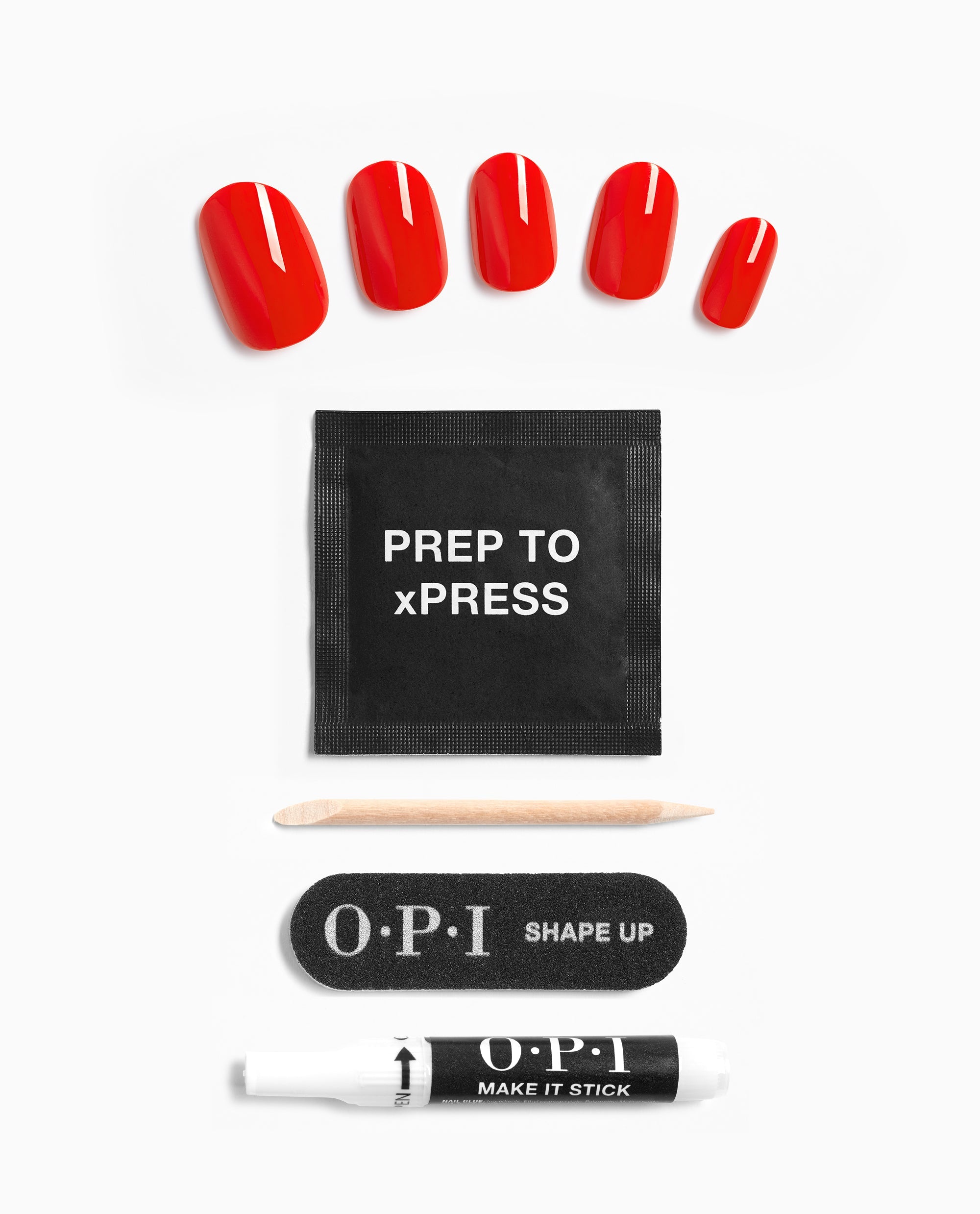 OPI Cajun Shrimp xPRESS/ON press-on nails in glossy trending coral red are arranged with prep pad, cuticle stick, Shape Up nail file, and Make It Stick glue on a white background.