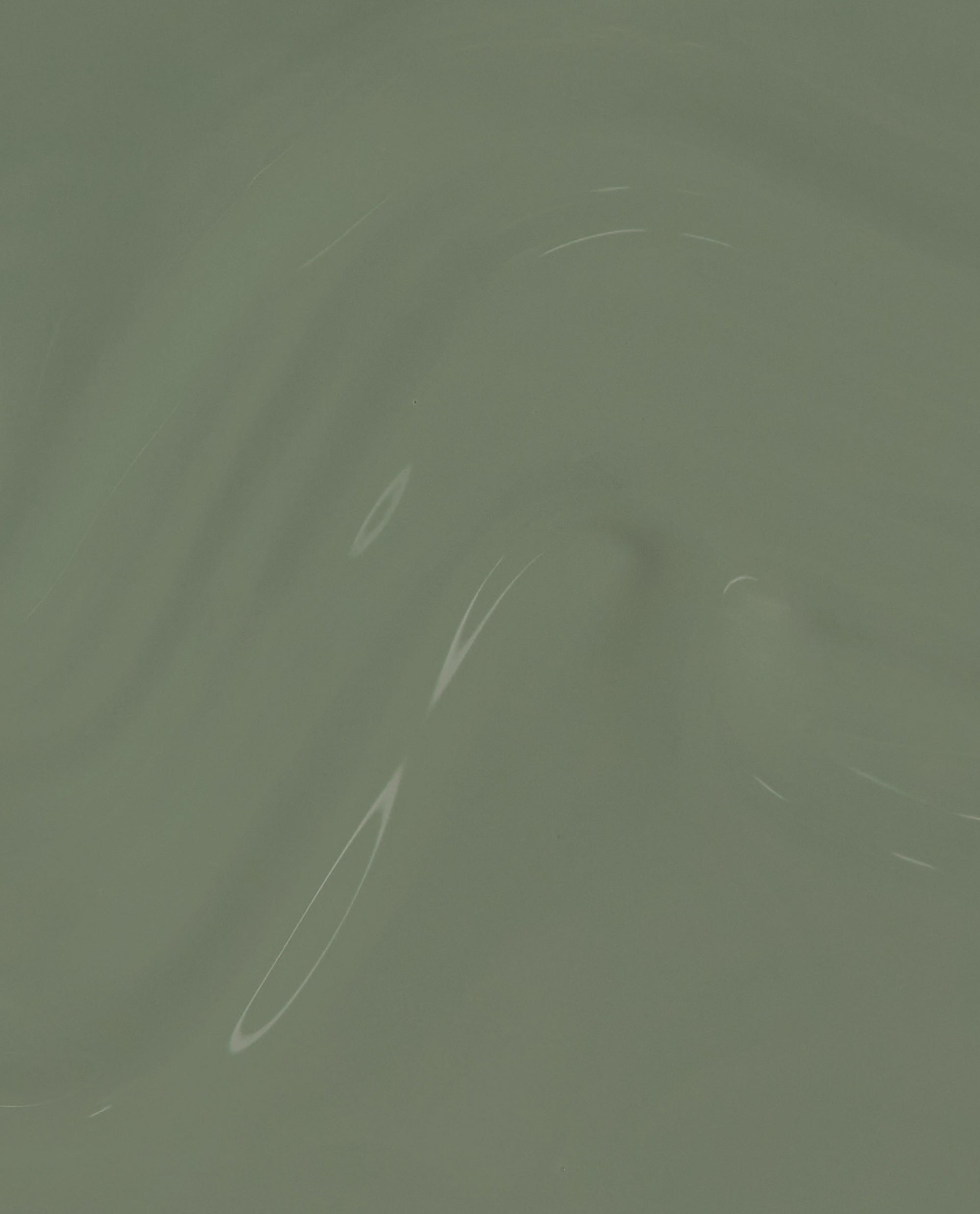 Cargo All Out Gel Nail Polish swatch, glossy sage green nail polish swirling in smooth waves on a clean studio backdrop, showcasing a muted hue ideal for spring nail colors and a trend-forward pick often searched with OPI.