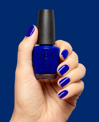Catch a Wave of Happiness Royal Blue Nail Polish Hand and Product