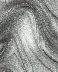 Metallic silver Chrome Clawz nail lacquer swirls in a close-up, showcasing ultra-fine shimmer and high-shine chrome finish, ideal for fans of OPI nail polish and bold, futuristic manicures.