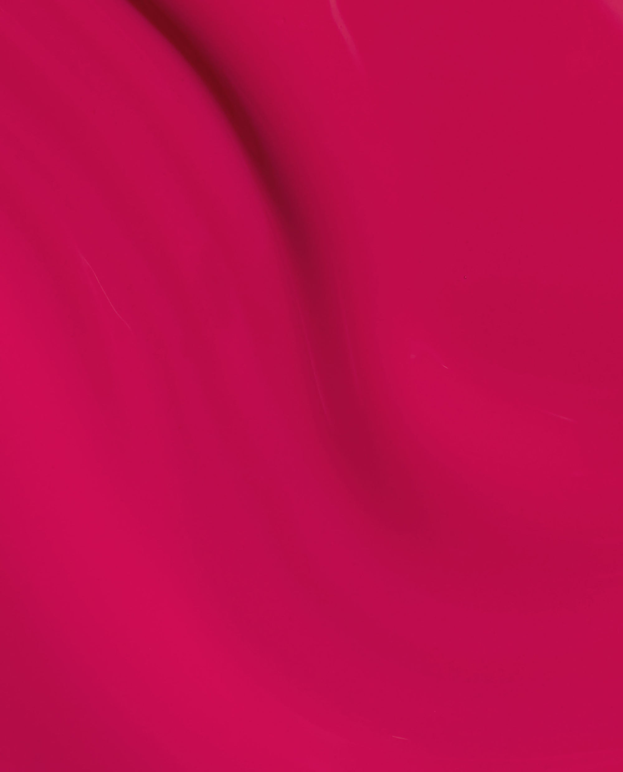 Clawberry Margarita at-home gel nail polish shown as a smooth, glossy hot pink swatch with subtle ripples, ideal as a bold summer shade or added to an OPI nail polish gift set for salon-quality manicures at home.