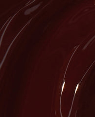 Deep burgundy Complimentary Wine nail lacquer swirled in glossy curves, showing the rich, opaque finish and shine of this OPI nail polish shade in a close-up brush swatch.