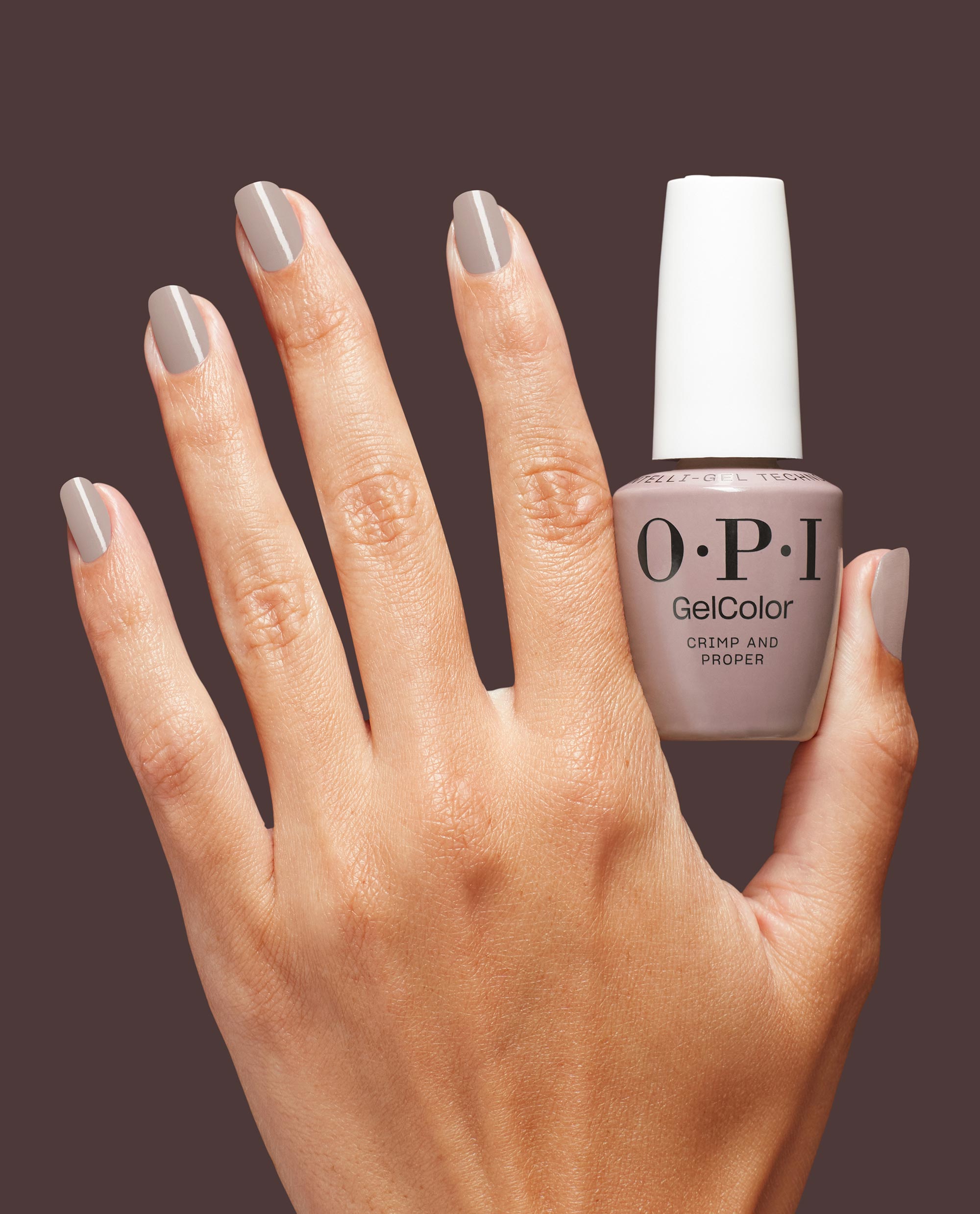 Crimp and Proper Gel Nail Polish Hand and Bottle