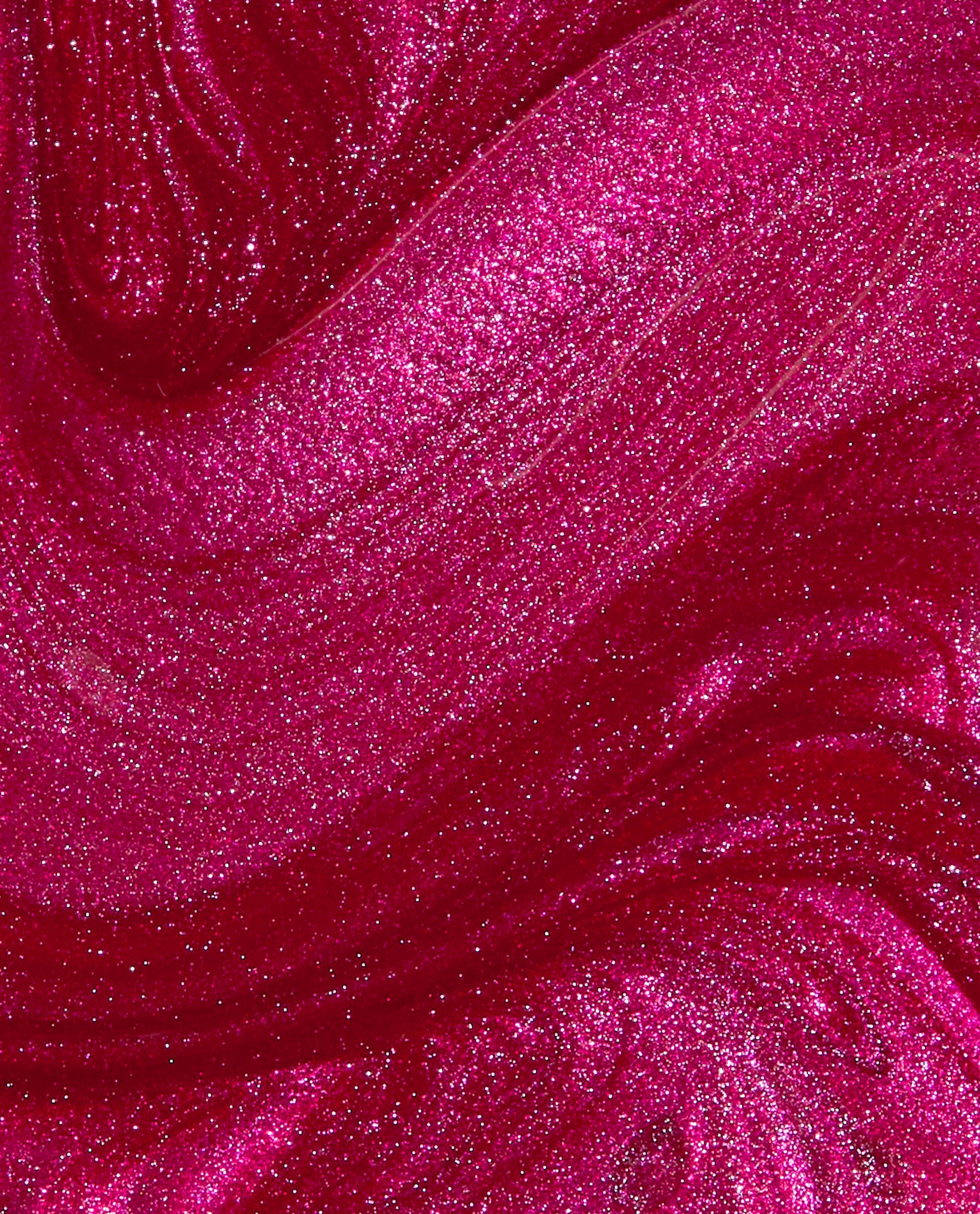 DeJa RoUgE Infinite Shine OPI nail polish swatch swirling in close-up, showing rich ruby-red color with intense pink shimmer and metallic sparkle across smooth, glossy liquid texture.