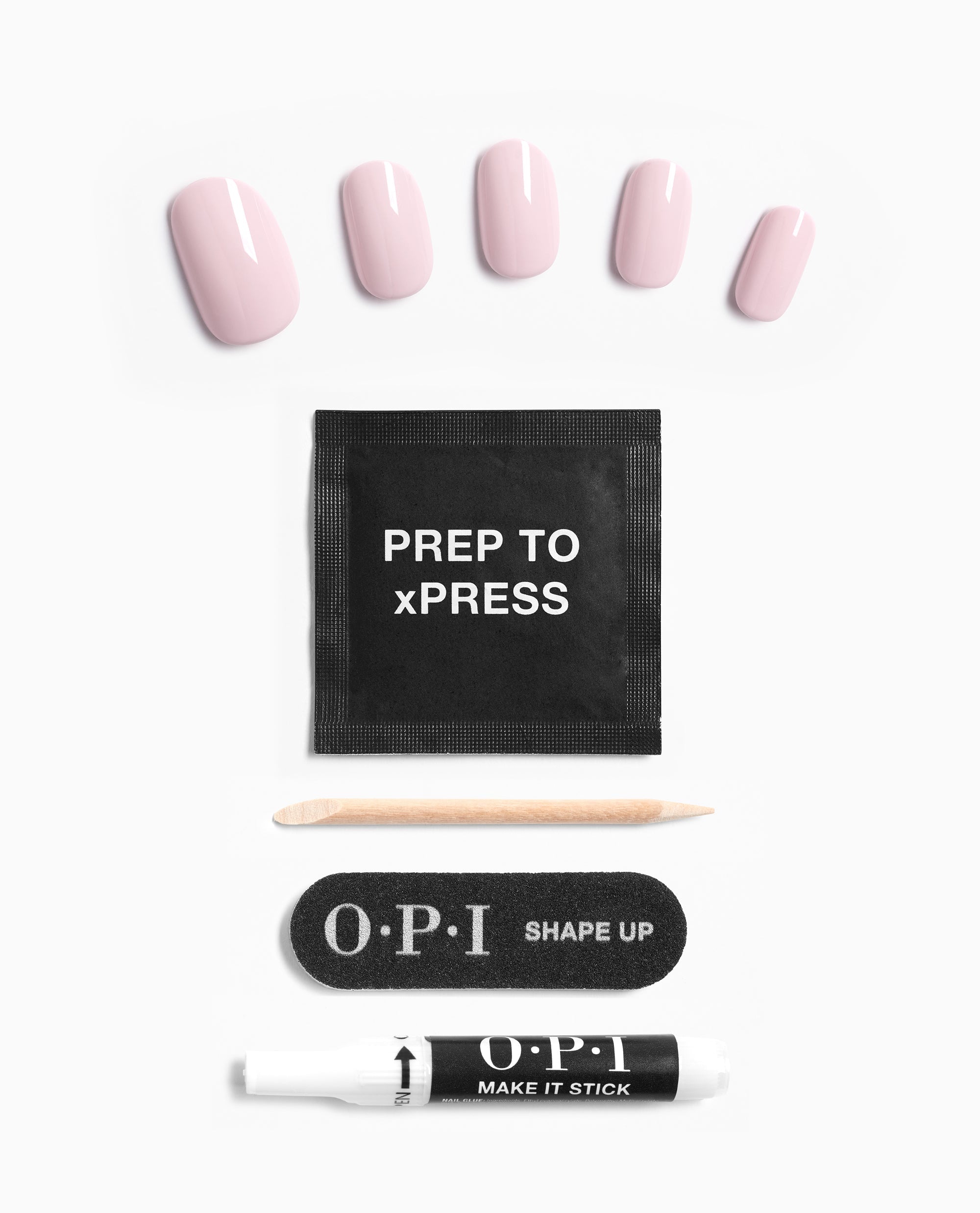 OPI Don’t Bossa Nova Me Around xPRESS/ON Iconic Shades (Short) artificial nail kit showing soft pink press-on nails, prep pad, wooden cuticle stick, mini nail file, and adhesive pen arranged neatly on a white background, ideal as a nail polish gift set.