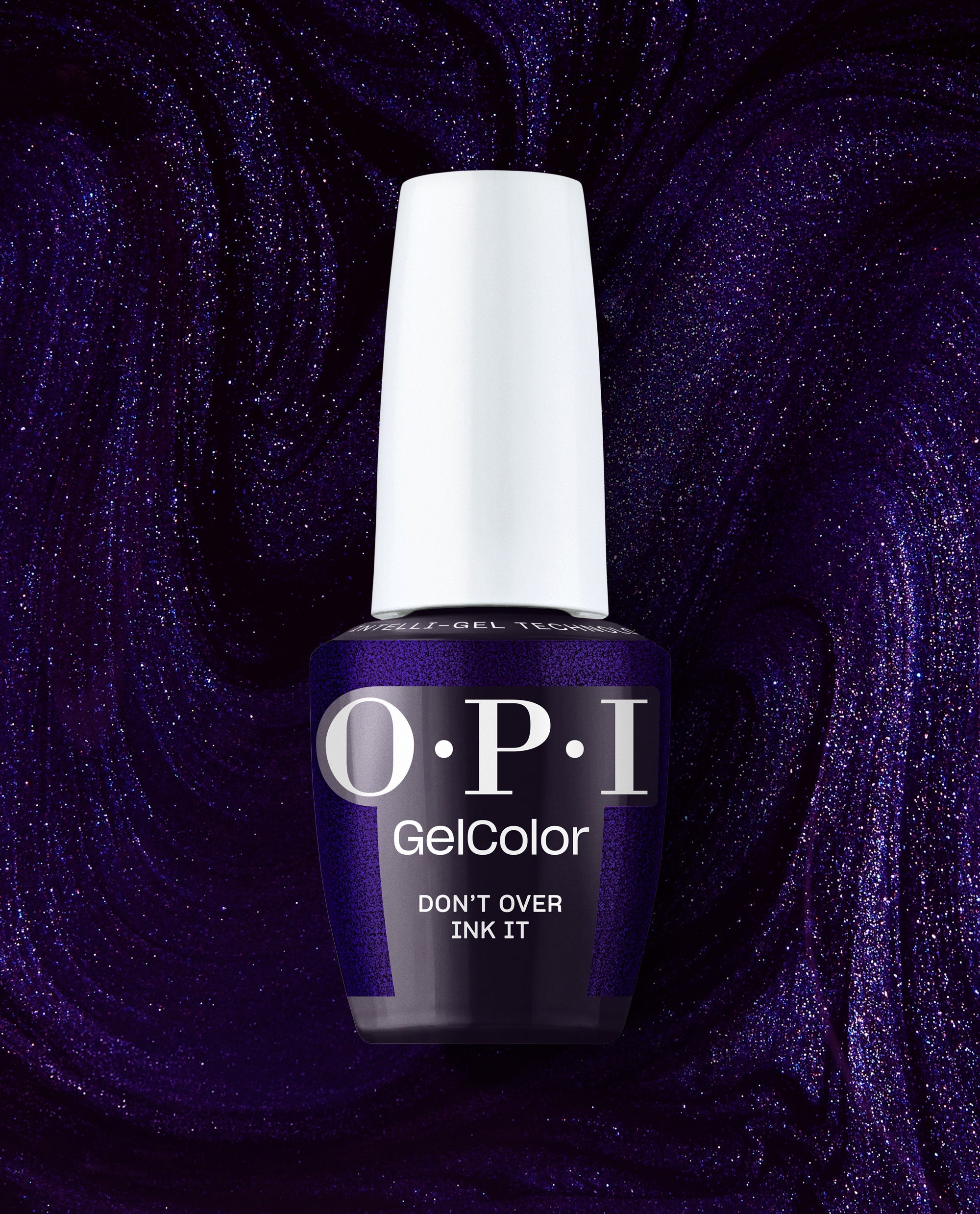 OPI Don’t Over Ink It GelColor gel nail polish bottle stands against a sparkling deep purple swirled backdrop, showcasing a rich violet shimmer shade for fall nail colors.