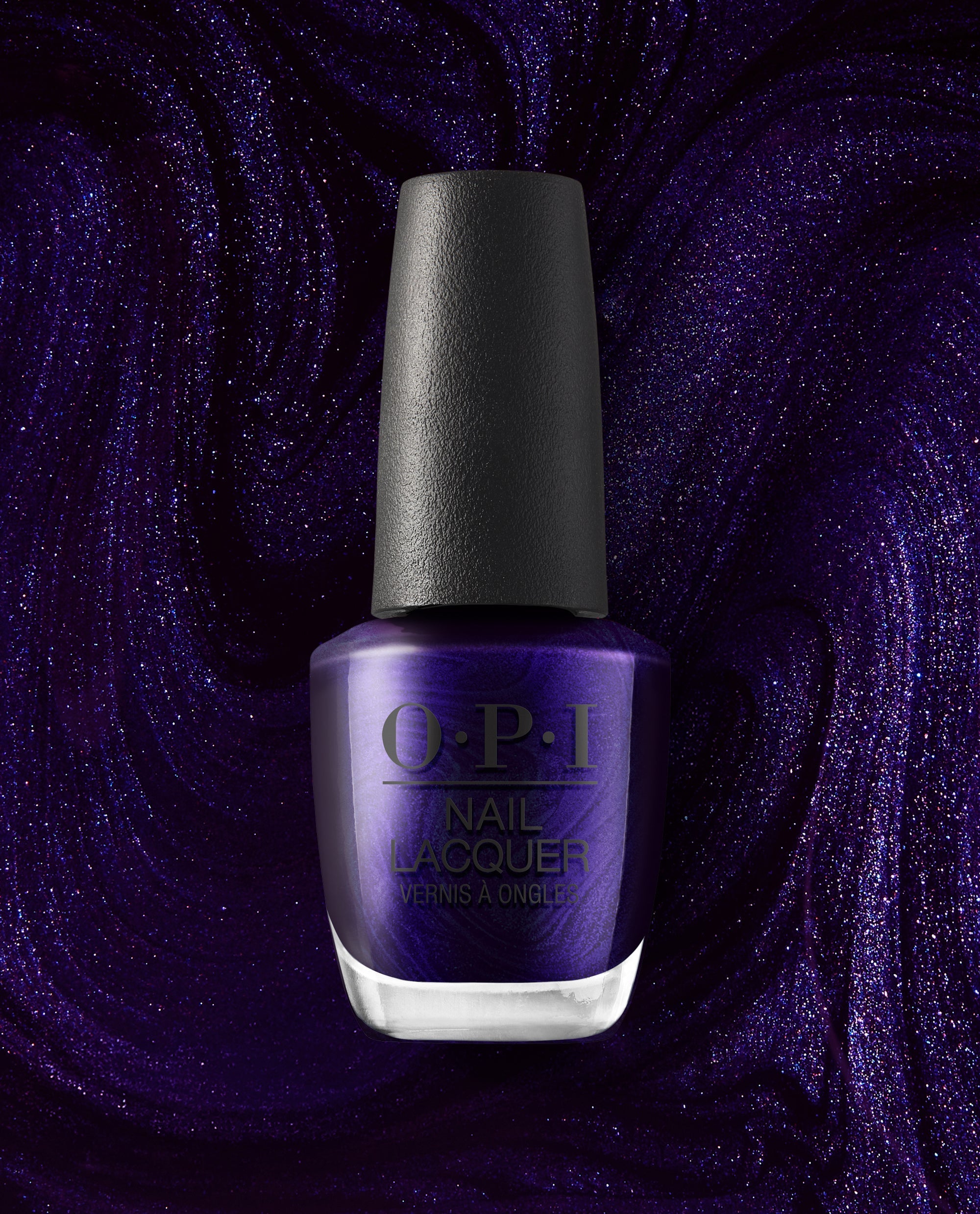 OPI Don’t Over Ink It nail lacquer bottle showing a deep shimmering purple fall nail color against a sparkling violet swirled polish background.