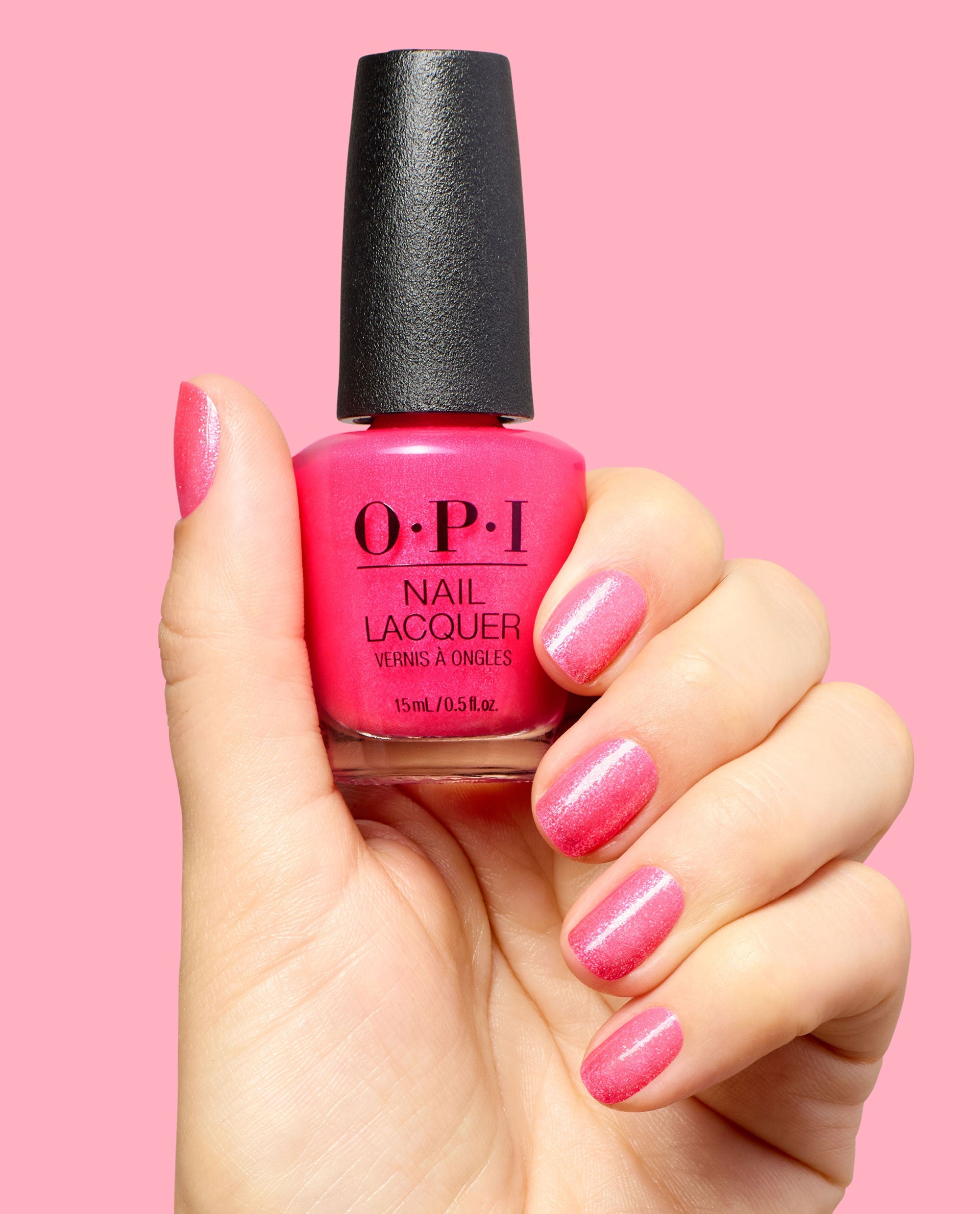 Dopa-mani Pink Shimmer Nail Polish Hand and Product