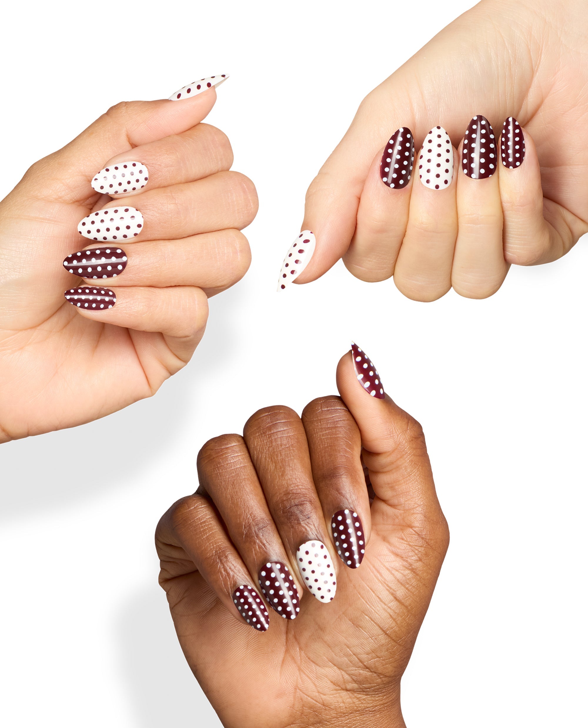 Dotticure On Point manicure shows almond nails in burgundy and white polka dots on three hands, highlighting OPI fall nail colors against a clean white background.