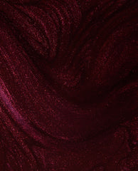 Every Month is Oktoberfest OPI nail lacquer swatch shows a deep burgundy-plum shimmer with fine red sparkle, a rich choice for fall nail colors.
