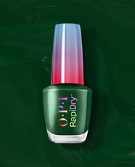 OPI RapiDry Fir Surely Fast green nail polish bottle stands upright with an iridescent pink-blue cap on a glossy dark green swirled background.