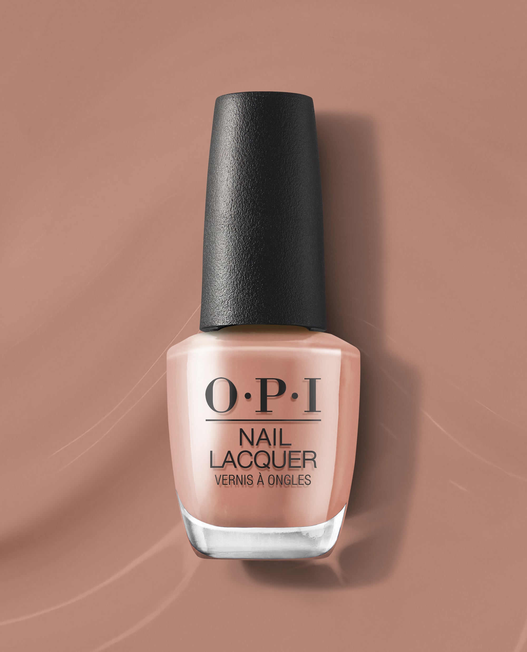 OPI nail polish bottle of Flannel Aerobics nail lacquer standing upright, showcasing a warm neutral mauve shade with black cap, centered against a matching smooth taupe background for a clean, modern product display.