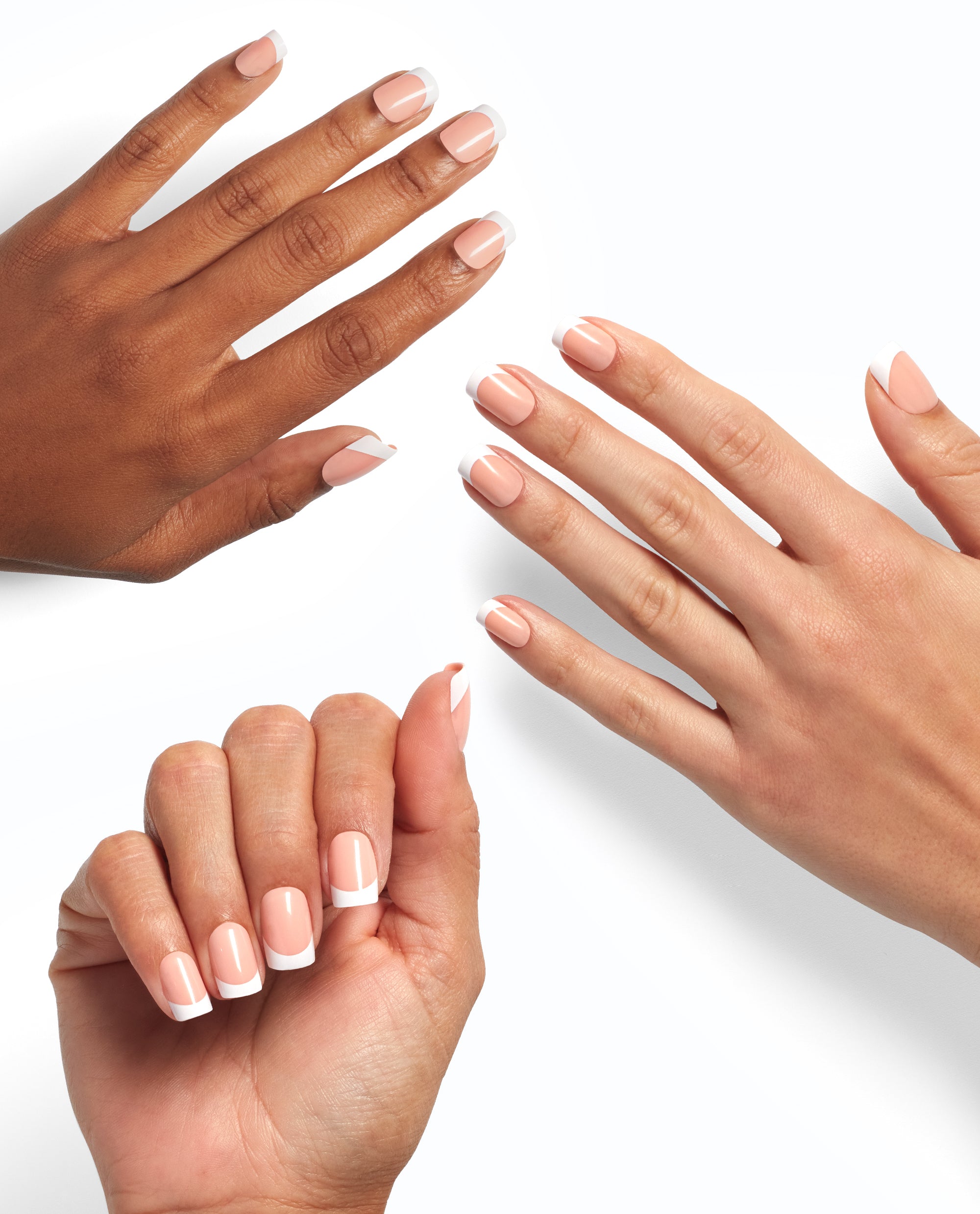 Three manicured hands show the Fluent in French On Point OPI nail polish gift set effect, featuring glossy nude nails with crisp white French tips against a clean white background, highlighting the polished salon-quality finish.