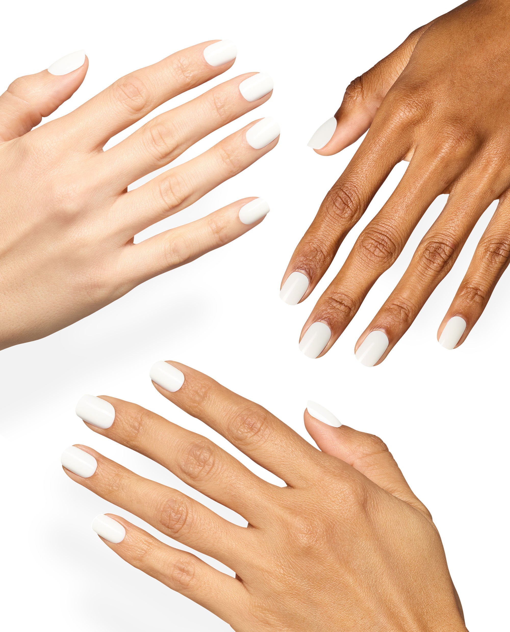 Hands model OPI Funny Bunny xPRESS/ON short white press-on nails on multiple skin tones against a clean white background, showcasing a soft neutral shade for fall nail colors.