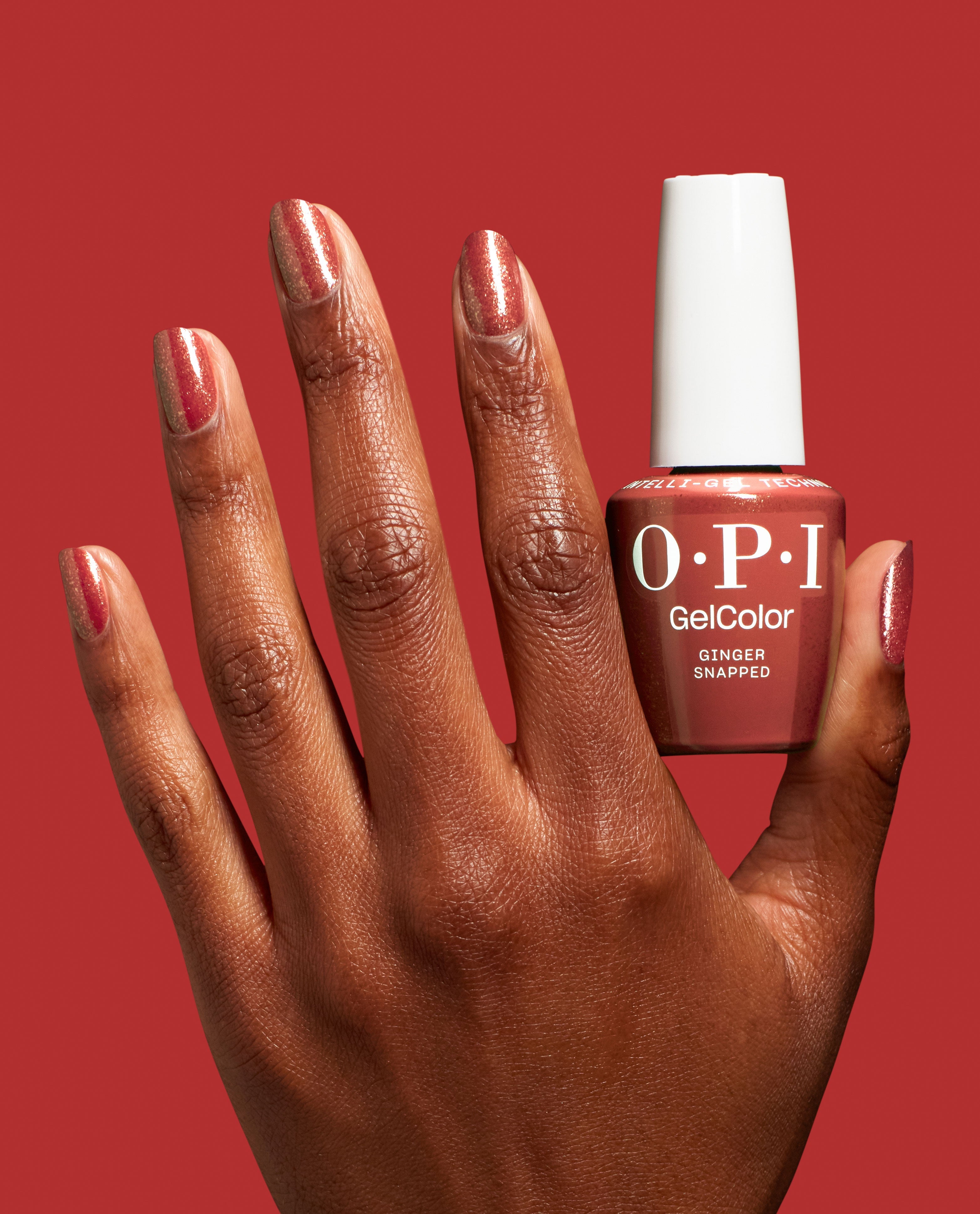 Ginger Snapped Brown Gel Nail Polish Hand and Bottle