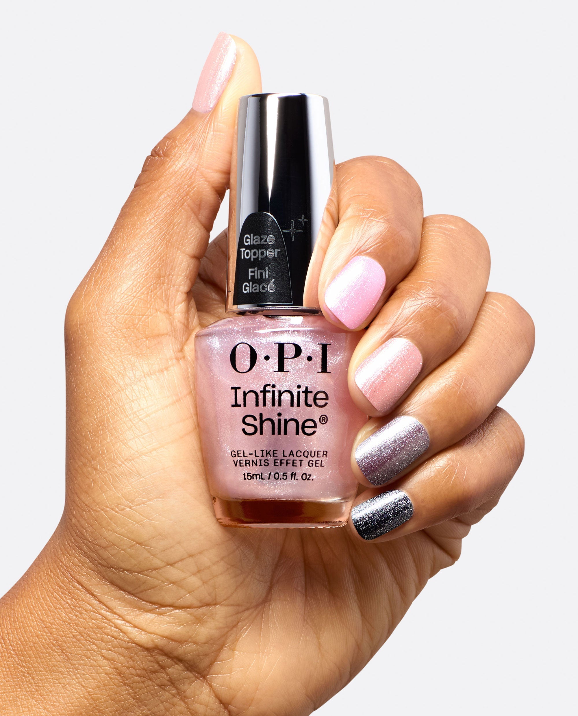 Glass Me Anything Silver Shimmer Glaze Nail Polish Topper Hand and Bottle