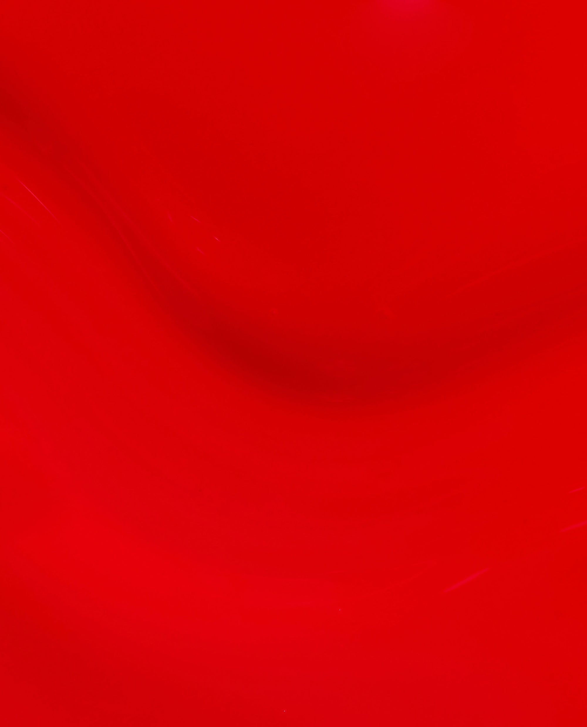 Glossy Goddess at-home gel nail polish swatch shows a smooth, vivid glossy red finish for bold fall nail colors.