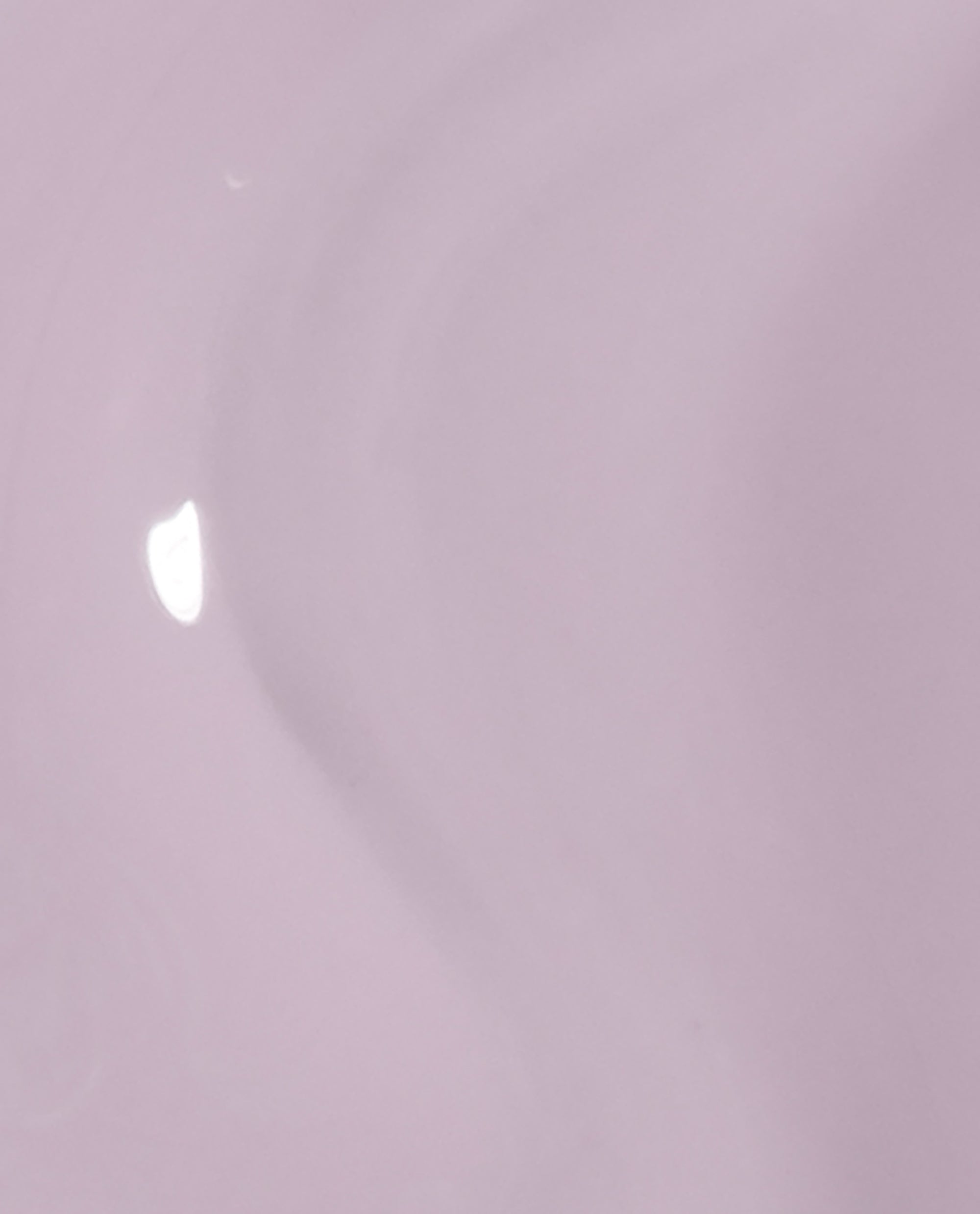 Soft lavender-pink Graffiti Sweetie nail lacquer swatch with a smooth, glossy finish and subtle light reflection, showcasing the pastel shade and creamy coverage of this OPI nail polish for manicures and pedicures.