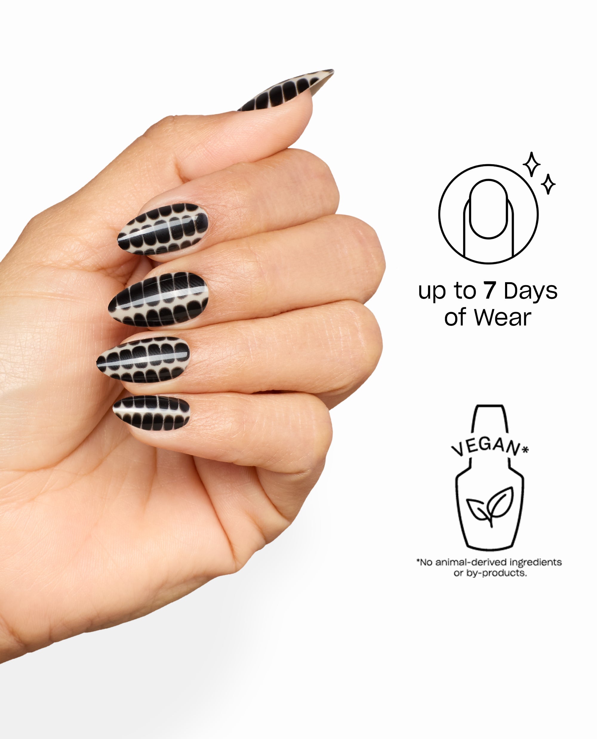 Hiss & Tell Sticking Point press-on nails show glossy black-and-beige snakeskin nail art on a hand, highlighting OPI fall nail colors with up to 7 days of vegan wear.