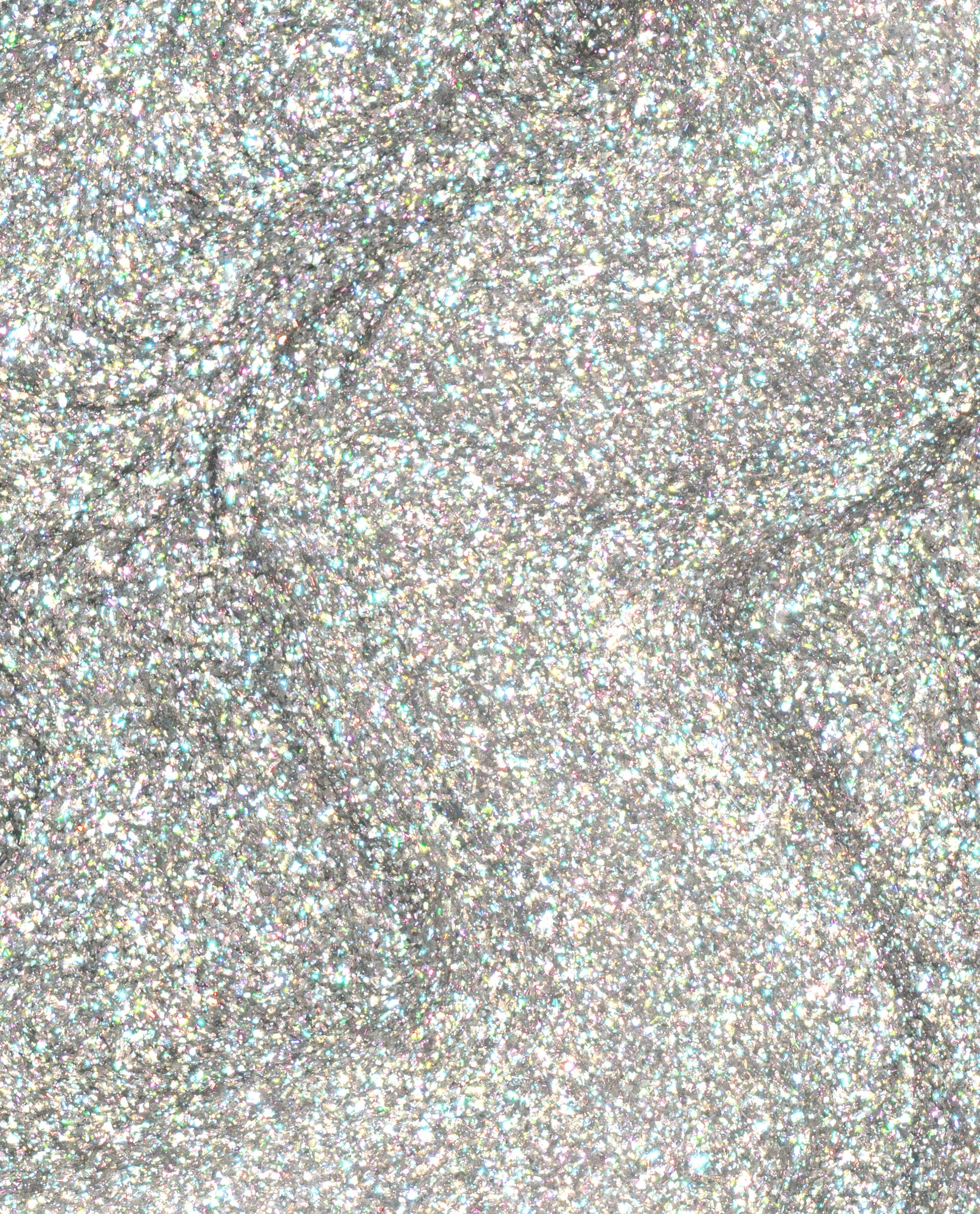 Close-up swatch of OPI nail polish I Cancer-tainly Shine nail lacquer, showing densely packed silver holographic glitter particles reflecting rainbow sparkles in a smooth, full-coverage metallic finish.