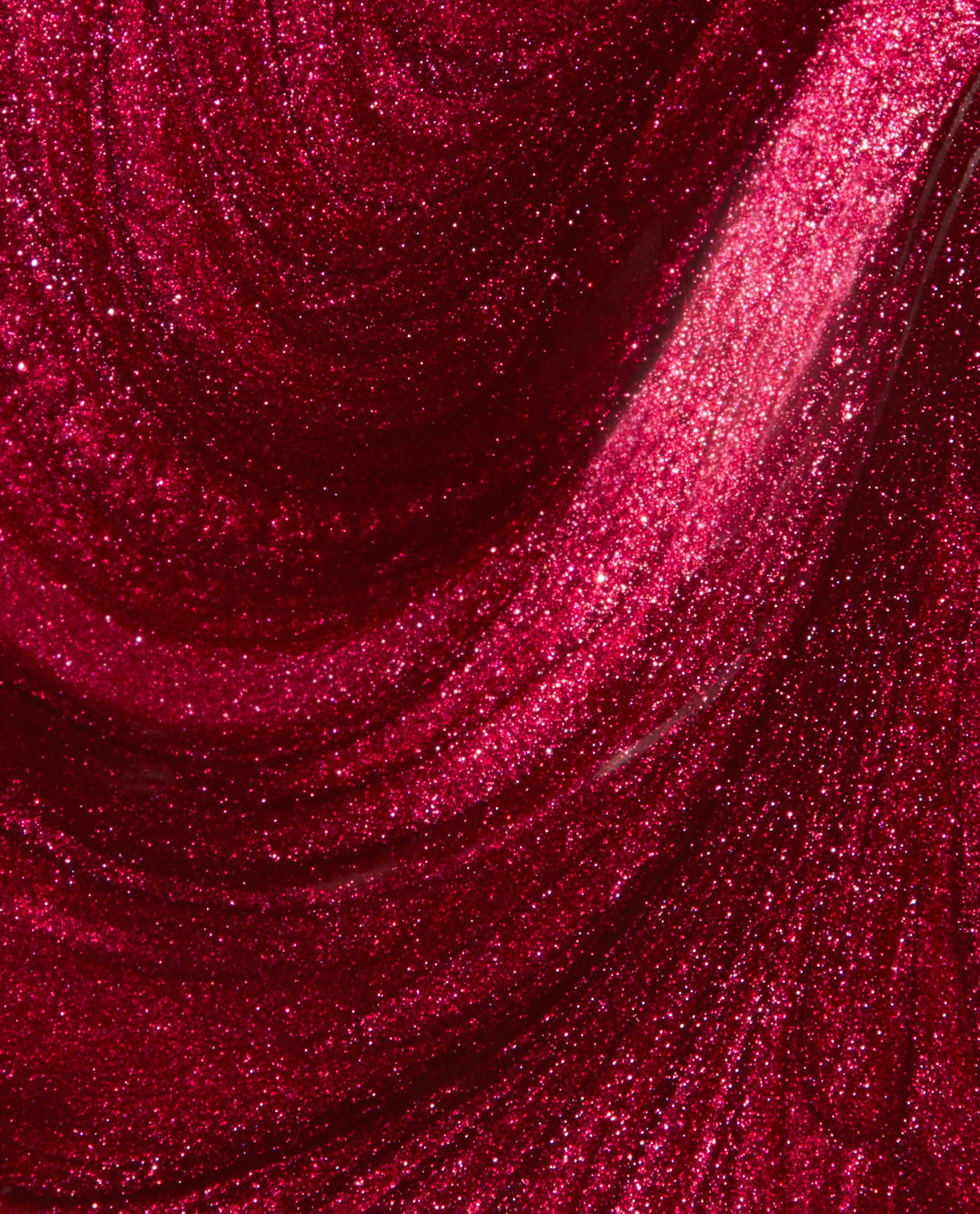 OPI Infinite Shine I'm Not Really a Waitress shimmers in a deep ruby red metallic nail polish swatch, a bold choice for fall nail colors.