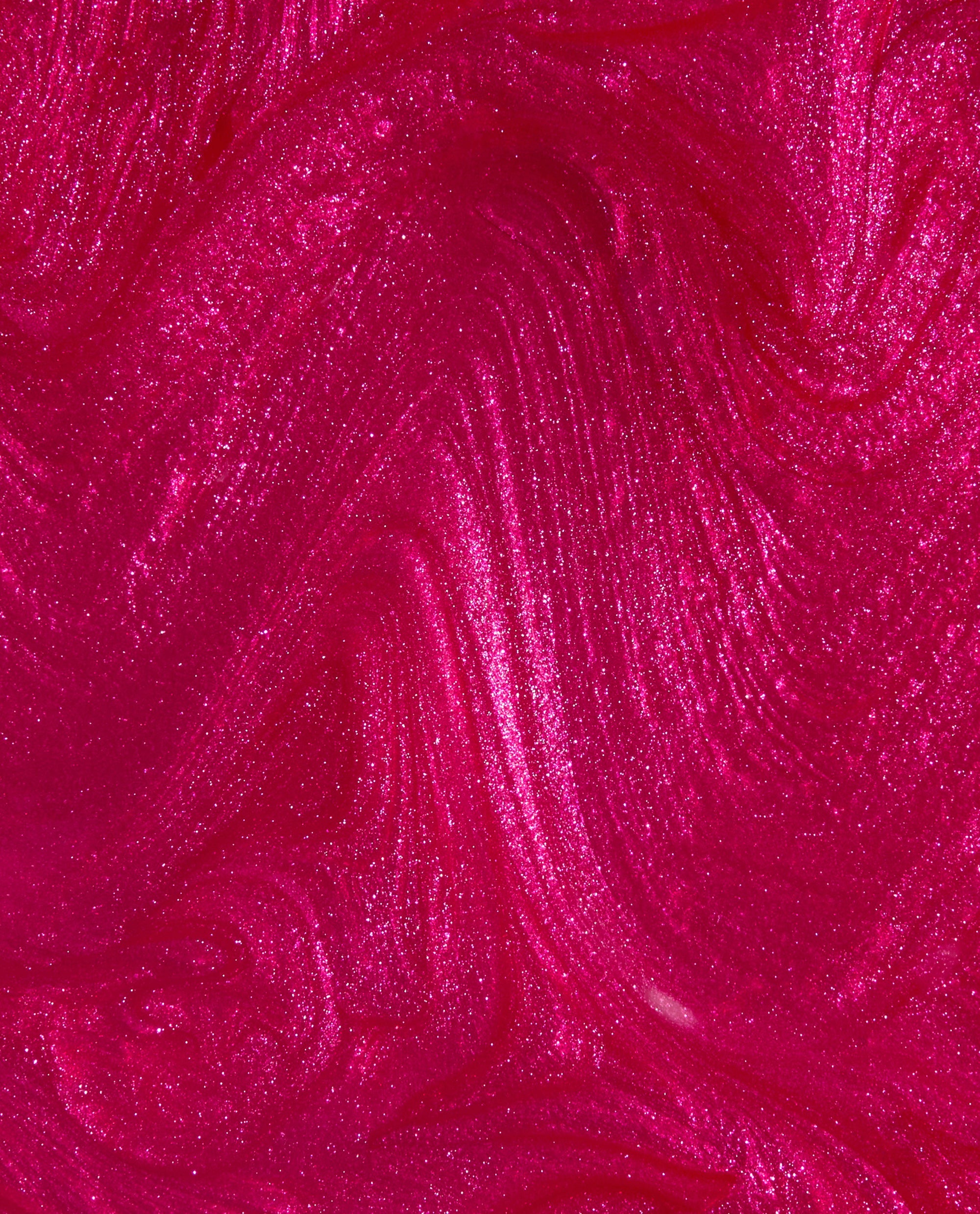 It’s All Greek to Me OPI nail lacquer swatch shows a vivid magenta-pink shimmer with fine glitter and pearly brushstroke texture, a bold choice for fall nail colors.