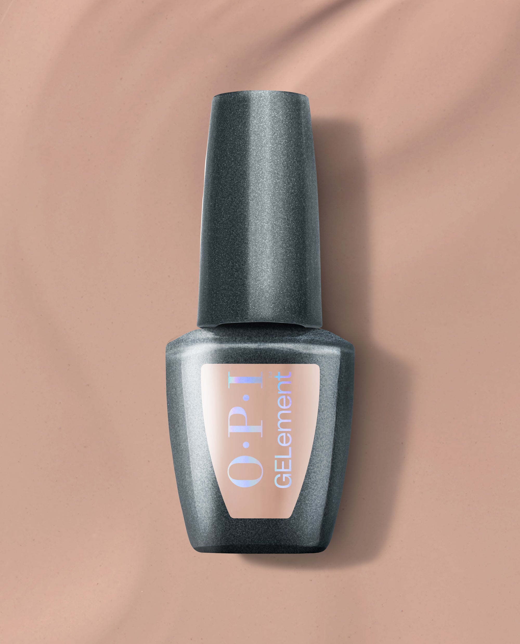 OPI Just Got Leid at-home gel nail polish bottle in shimmering charcoal gray stands upright on a nude background, a moody metallic shade for fall nail colors.