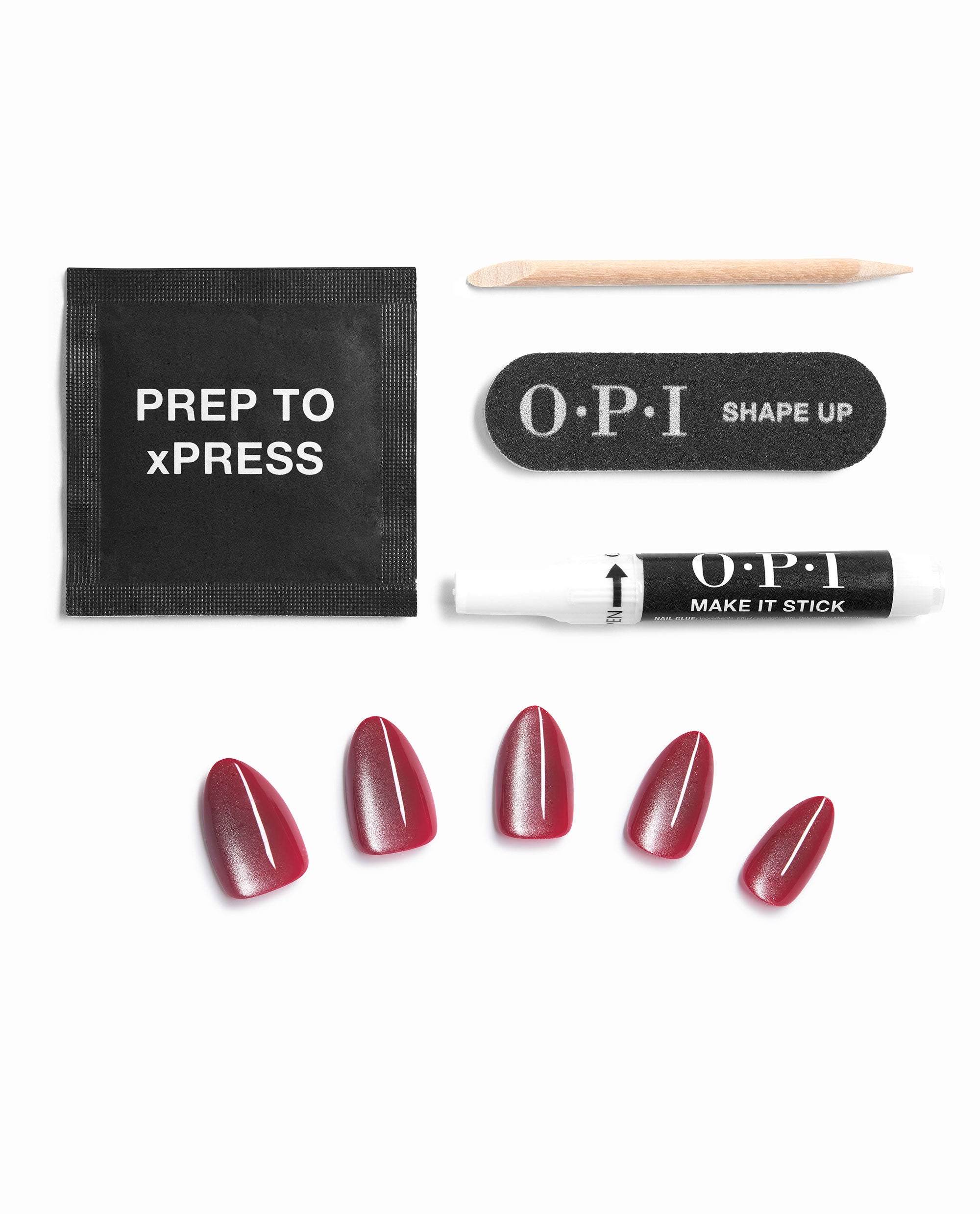 Kiss My Chic On Point OPI press-on nail kit displays shimmery berry-red artificial nails with glue, file, wooden cuticle stick, and prep pad on a white background, a polished pick for fall nail colors.