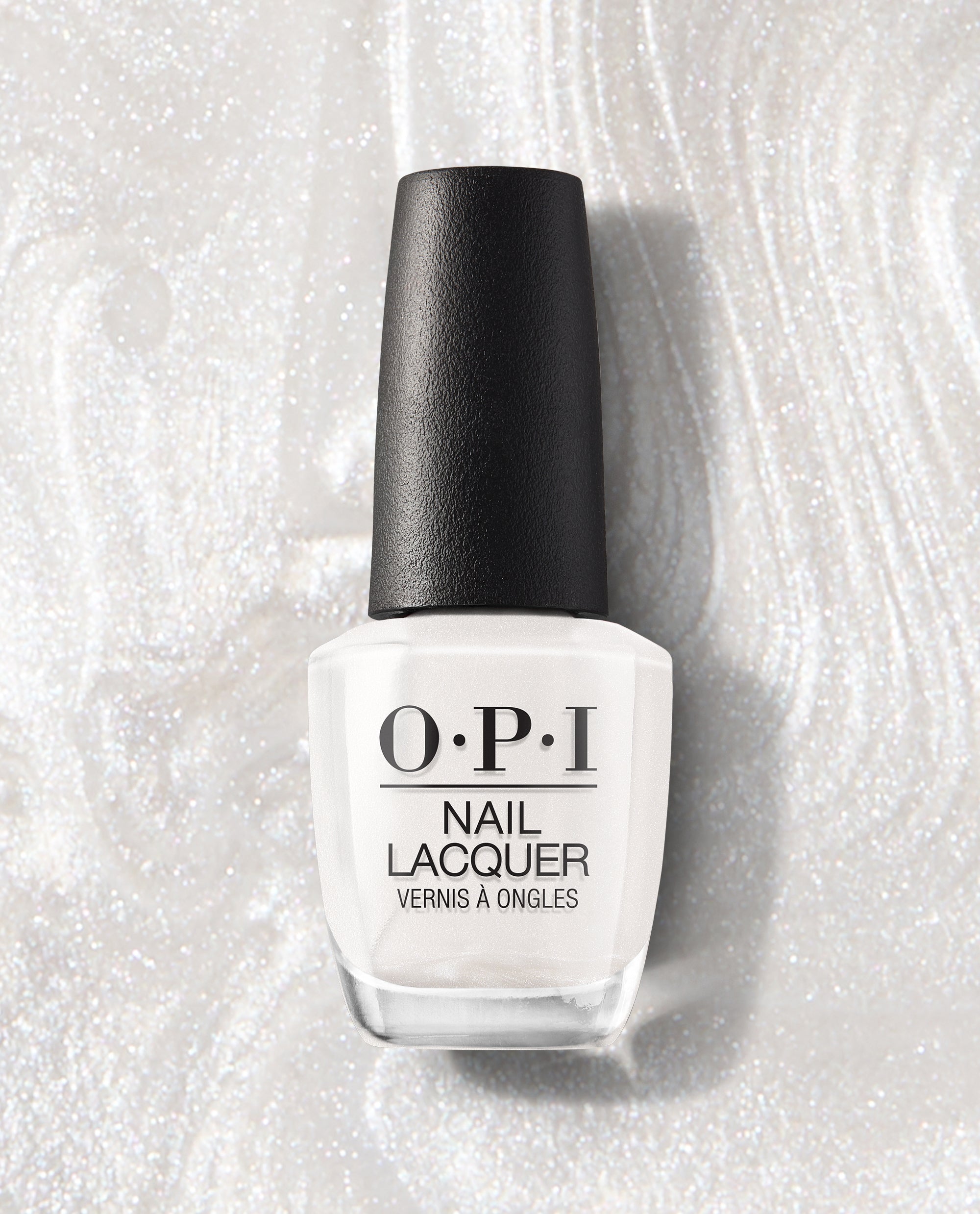 OPI Kyoto Pearl nail lacquer bottle stands upright with a black cap, showing a soft pearly white shimmer shade on a sparkling pearl-textured background, a trending manicure color.