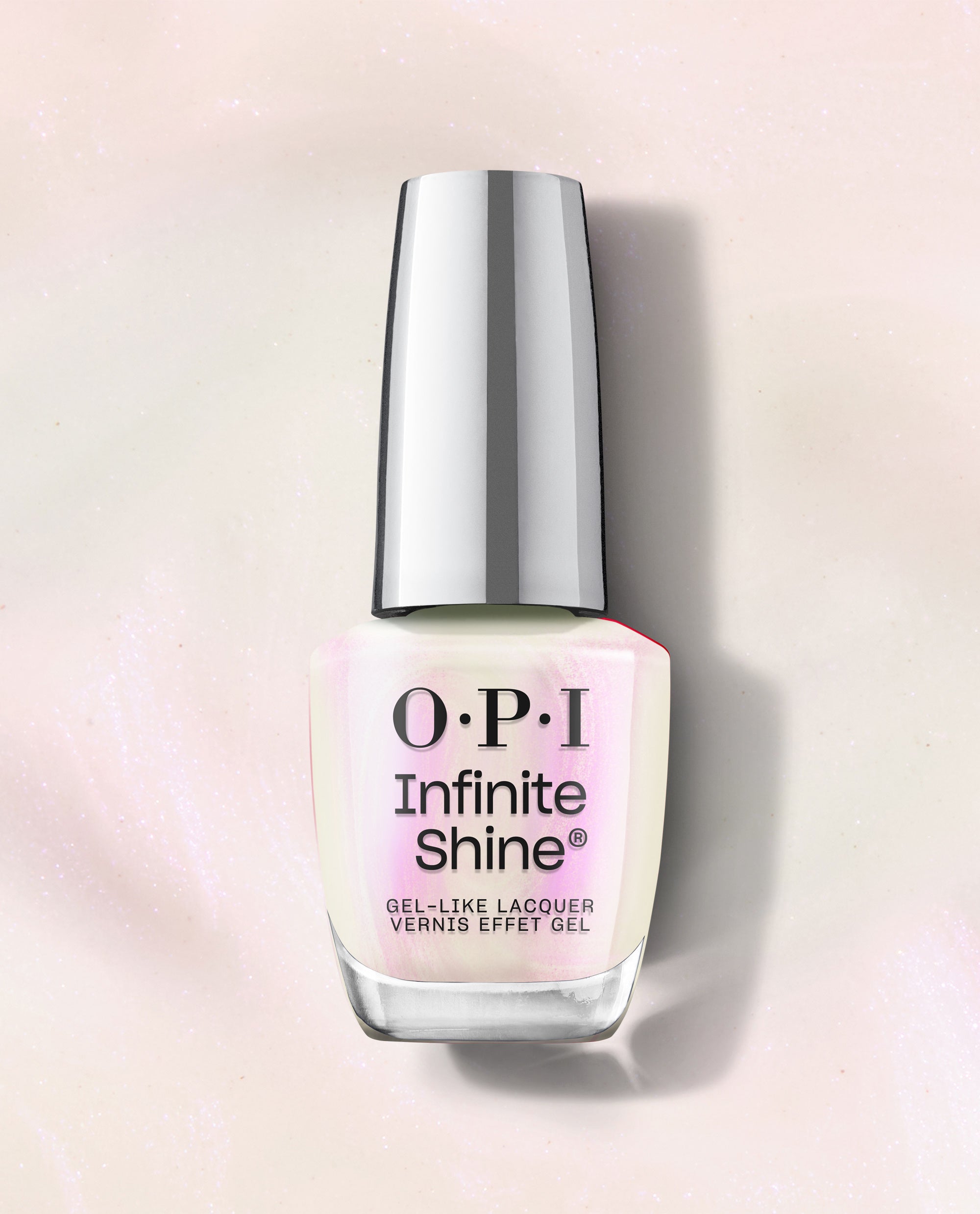 OPI Infinite Shine Kyoto Oyster white nail polish bottle stands upright, showing a pearly pink-white gel-like lacquer with a silver cap on a softly shimmering pale background.