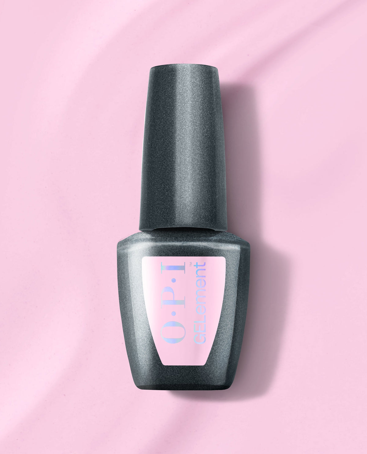 OPI Let Me Lavender at-home gel nail polish bottle stands upright on a pink background, with a black cap and soft pink GelColor label, a polished pick among fall nail colors.