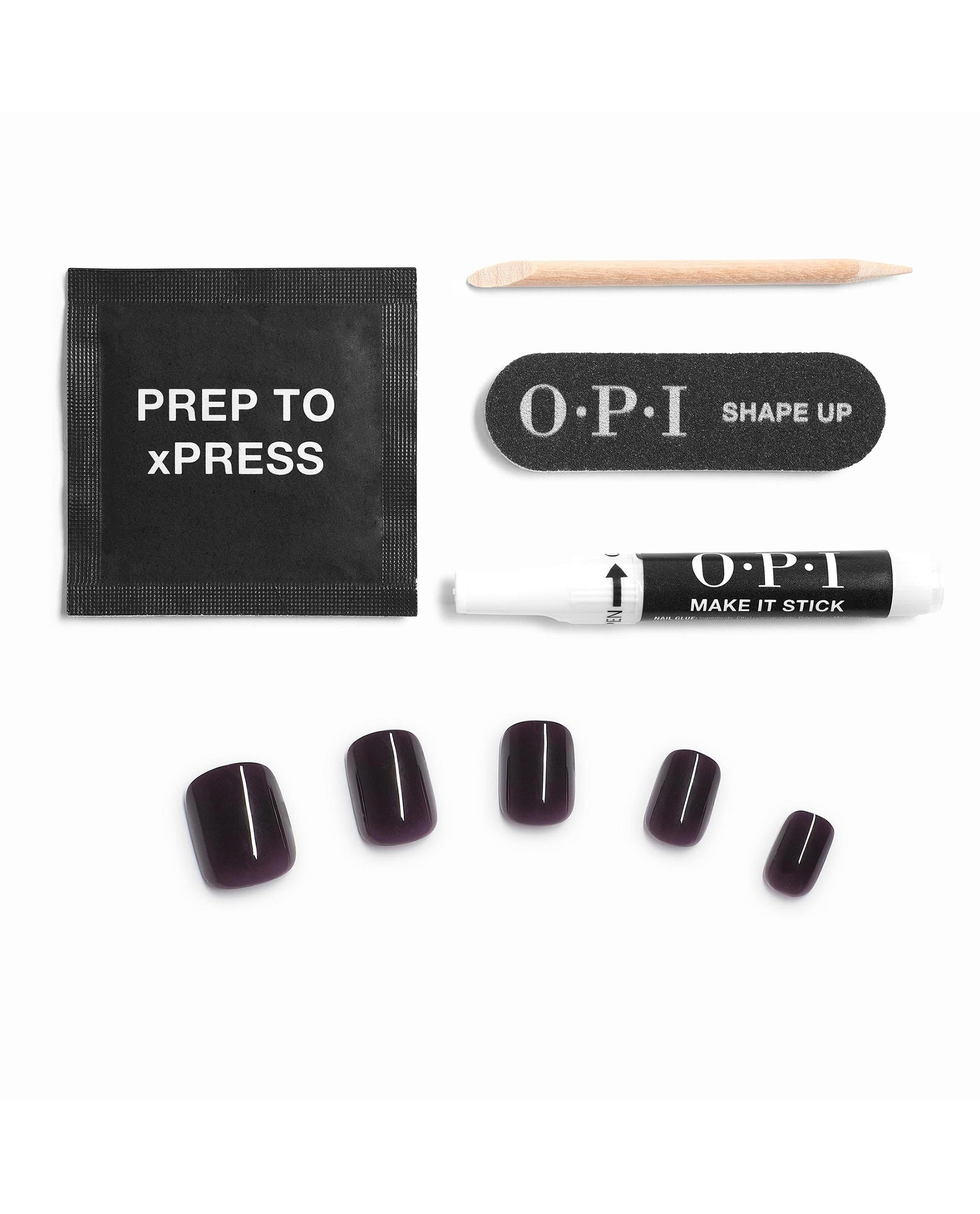 OPI Lincoln Park After Dark xPRESS/ON press-on nail kit displays glossy deep plum nails, prep pad, cuticle stick, file, and Make It Stick glue on a white background, ideal for fall nail colors.