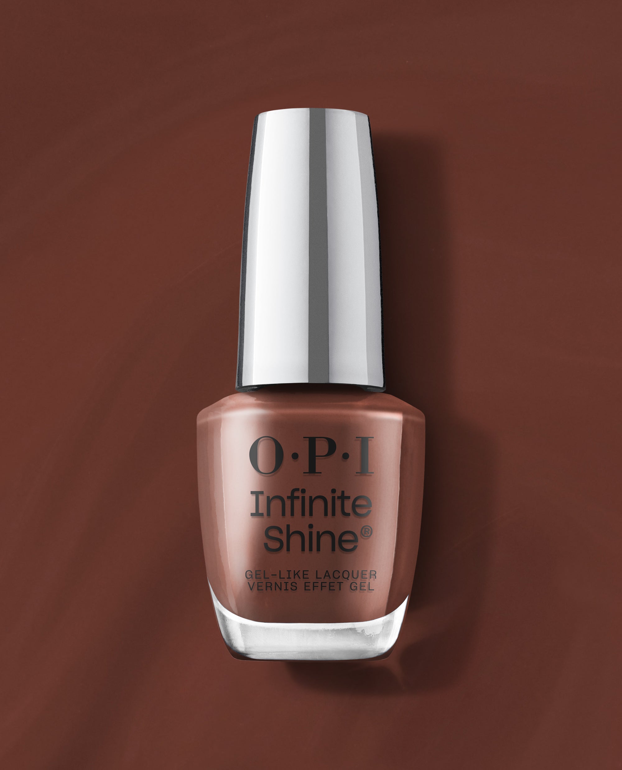 OPI Infinite Shine Lip Hot Liner gel-like lacquer bottle in a warm rosy brown shade, shown upright on a matching brown background for fall nail colors.