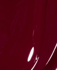OPI Malaga Wine nail lacquer shown as a glossy deep burgundy brush swatch, highlighting a rich wine-red shade ideal for fall nail colors.