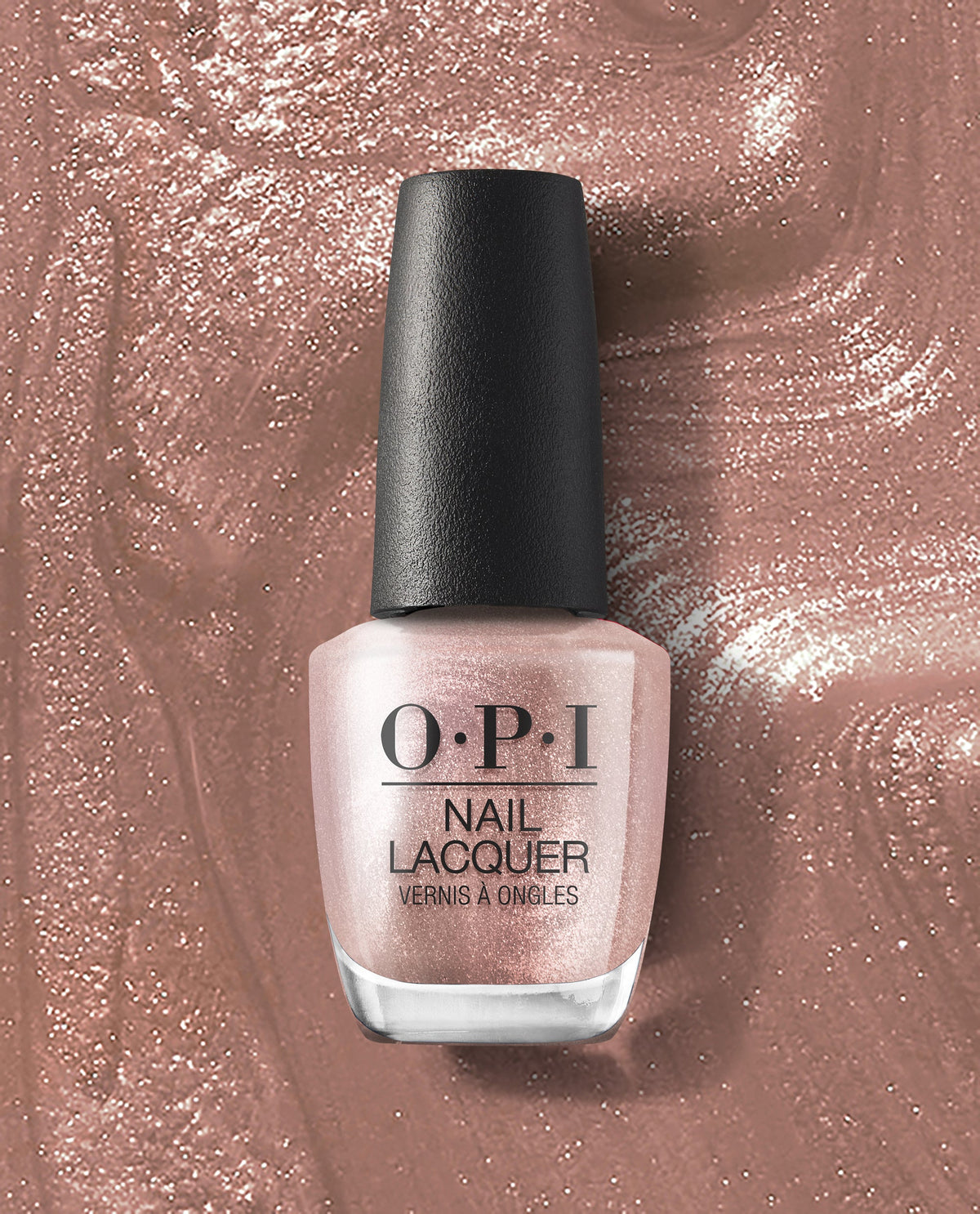 OPI nail polish Metallic Composition nail lacquer bottle standing upright, showing a shimmery rose-gold metallic shade against a matching sparkling polish smear background for a glam manicure look.