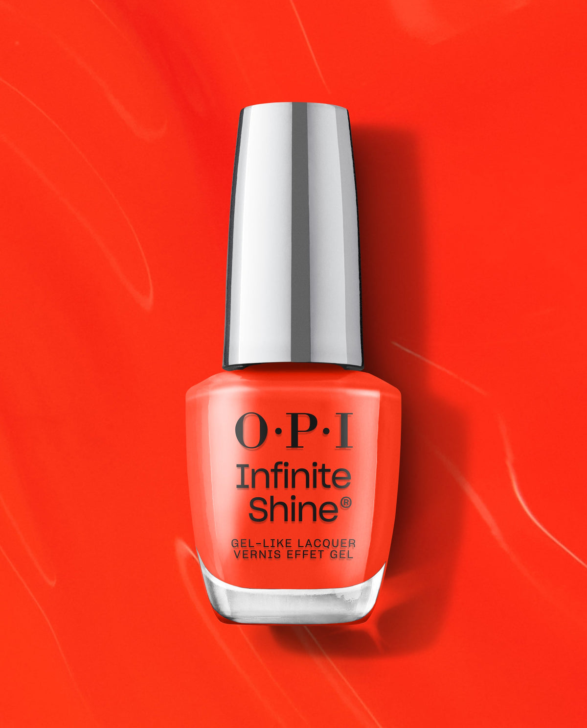 OPI nail polish bottle of Mini Plaid Flirt Infinite Shine in bright orange-red, standing upright with a reflective silver cap on a matching glossy red background, showcasing long-wear gel-like lacquer for manicures.