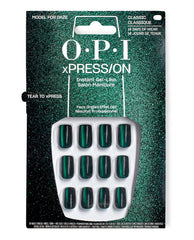 OPI xPRESS/ON Effects Model for Daze press-on nails displaying a deep emerald cat-eye green shine, arranged in a plastic tray within glittery teal retail packaging—green nail polish pick for spring nail colors by OPI.