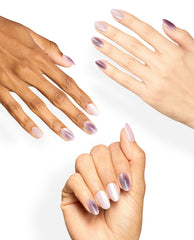 Hands with varied skin tones show OPI My Pink Aura xPRESS/ON almond nails in shimmery pale pink and mauve aura gradients, a soft option for fall nail colors on a white background.