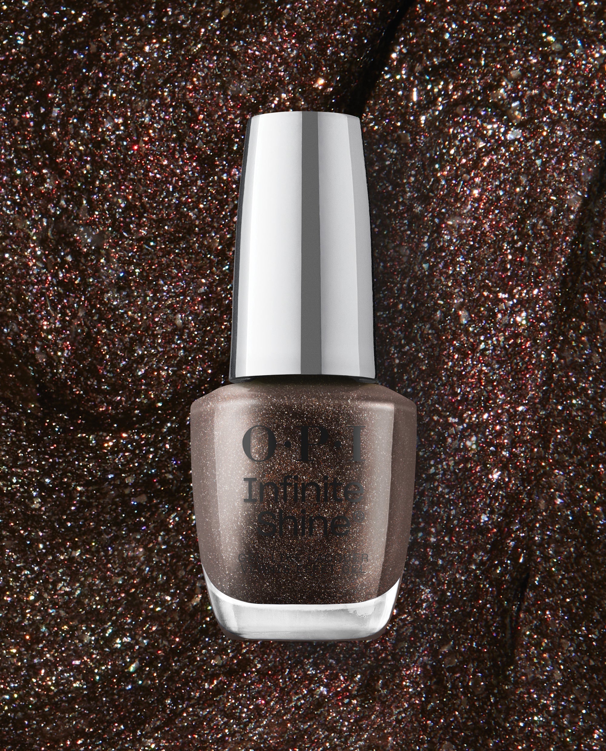 OPI Infinite Shine My Private Jet nail polish bottle in shimmering brown holographic lacquer stands against a matching glitter textured background, highlighting a trending long-lasting manicure shade.