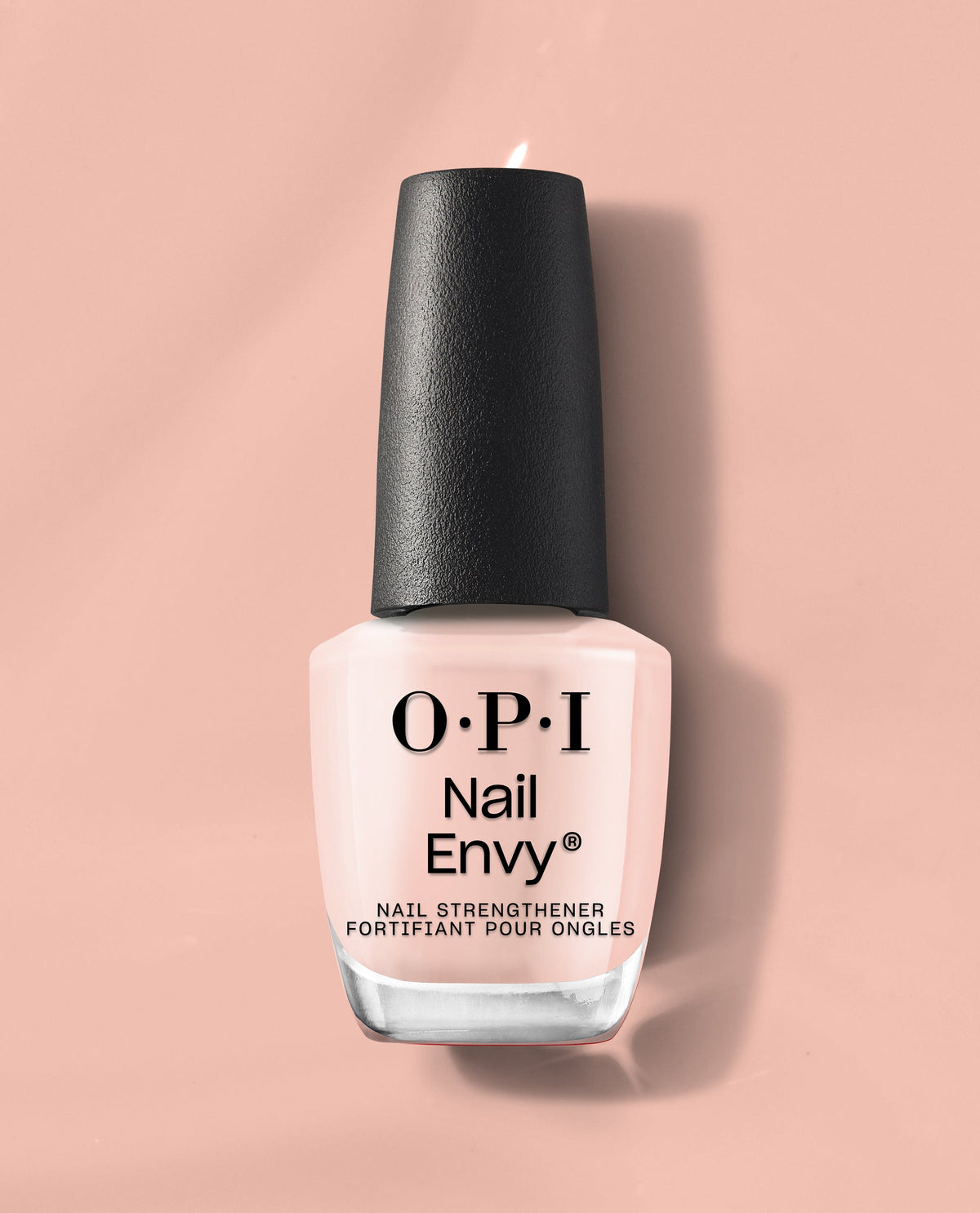 OPI Nail Envy Bubble Bath Nail Strengthener bottle standing upright, showing soft pink treatment polish with black cap and bold logo text against a matching nude-pink background, ideal as a nail polish gift set treatment for stronger nails.