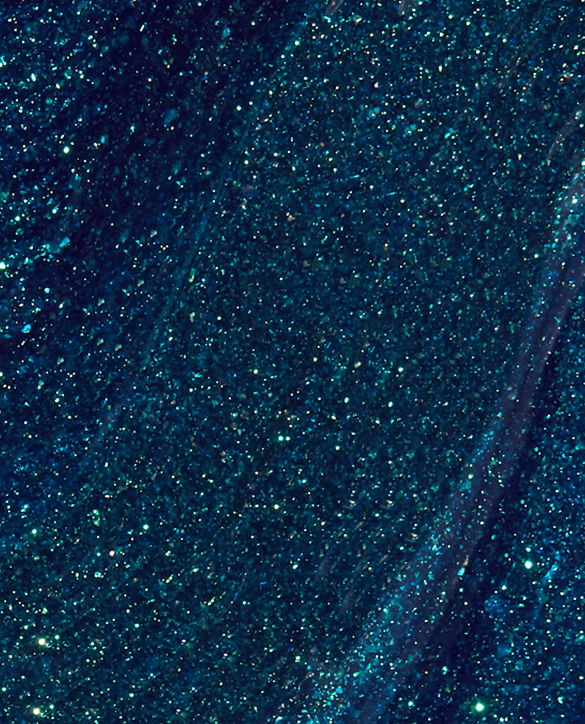 Nessie Plays Hide & Sea-k OPI nail polish swatch showing deep teal-blue nail lacquer packed with fine shimmering glitter, creating a sparkling, ocean-inspired finish in close-up detail.