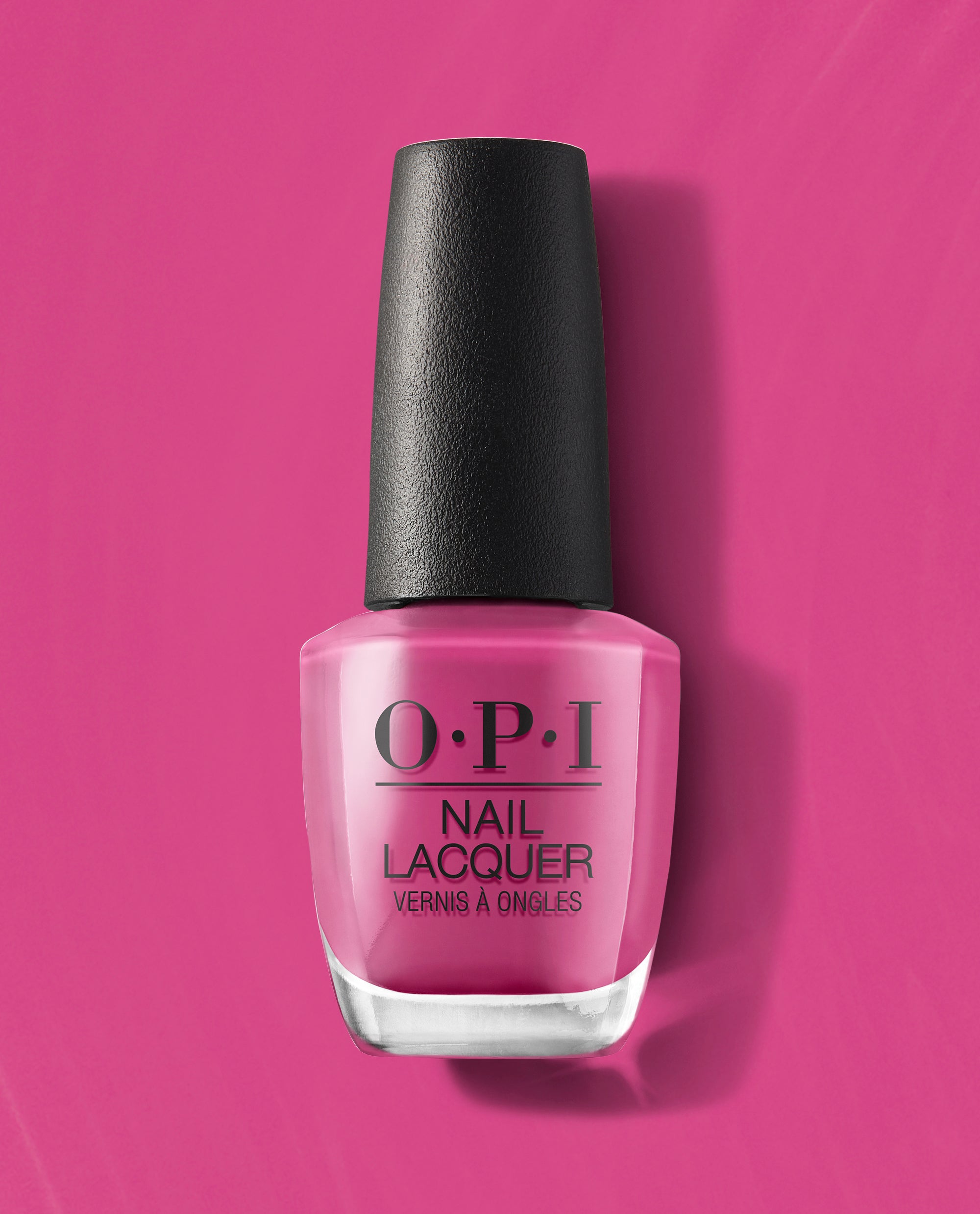OPI No Turning Back From Pink Street Nail Lacquer bottle stands upright, displaying a bold pink polish with a black cap on a matching pink background, a vibrant pick for spring nail colors and spring nail trends.