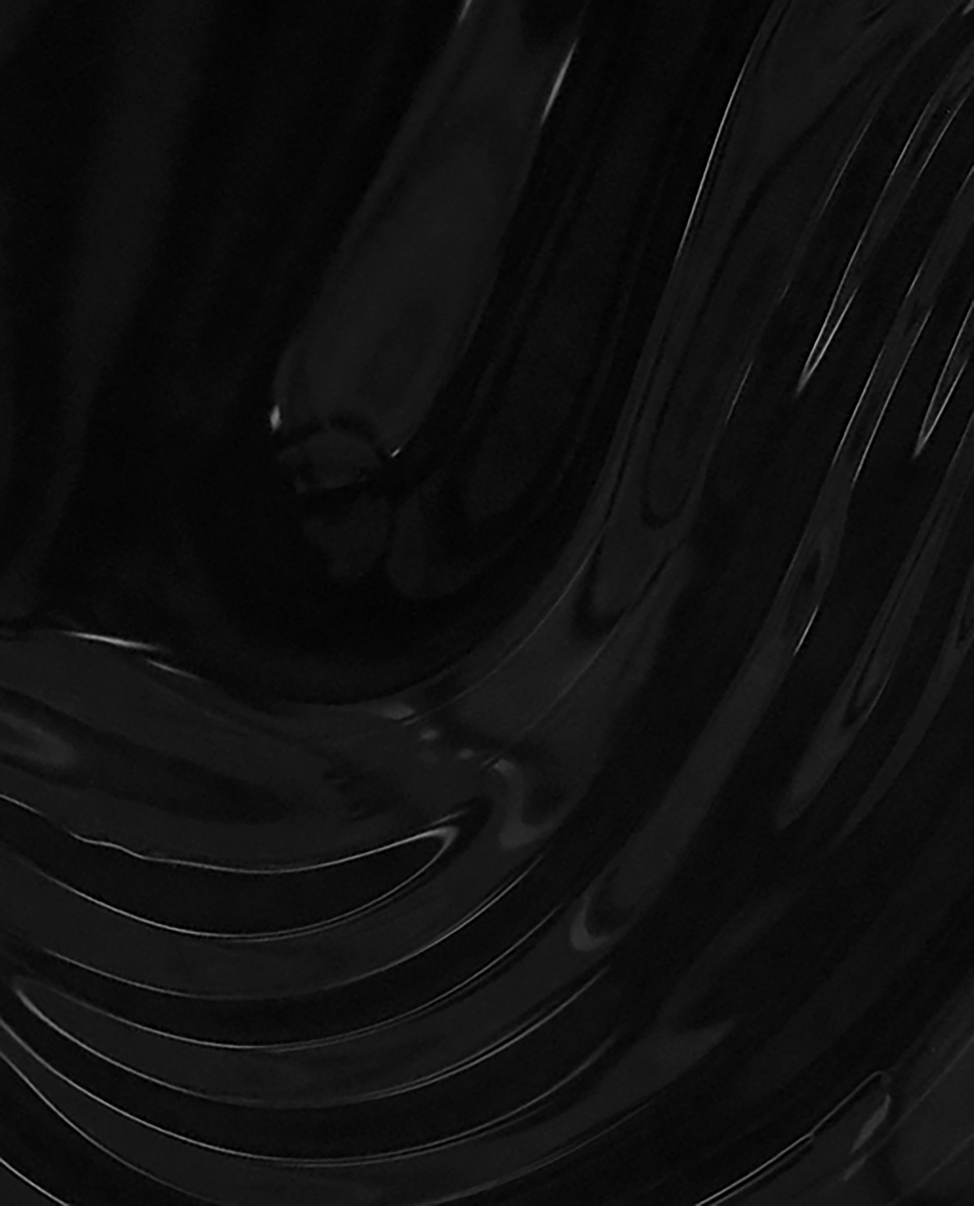 Onyx Skies OPI Nature Strong Vegan Nail Lacquer spreads in glossy jet-black brush swirls, showcasing a trending dark nail polish shade on a close-up lacquer texture.