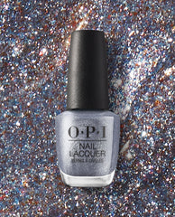 OPI Nails the Runway OPI nail polish bottle standing upright, showcasing silver glitter nail lacquer against a sparkling multicolor glitter background, emphasizing the shimmery, high-shine finish of this OPI nail lacquer shade.