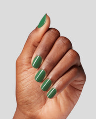 Manicured hand displaying glossy olive-green nails painted with OPI Infinite Shine OPI’m a Supermodel, showcasing rich green nail polish with a high-shine finish against a light gray background, ideal for spring nail colors from OPI.